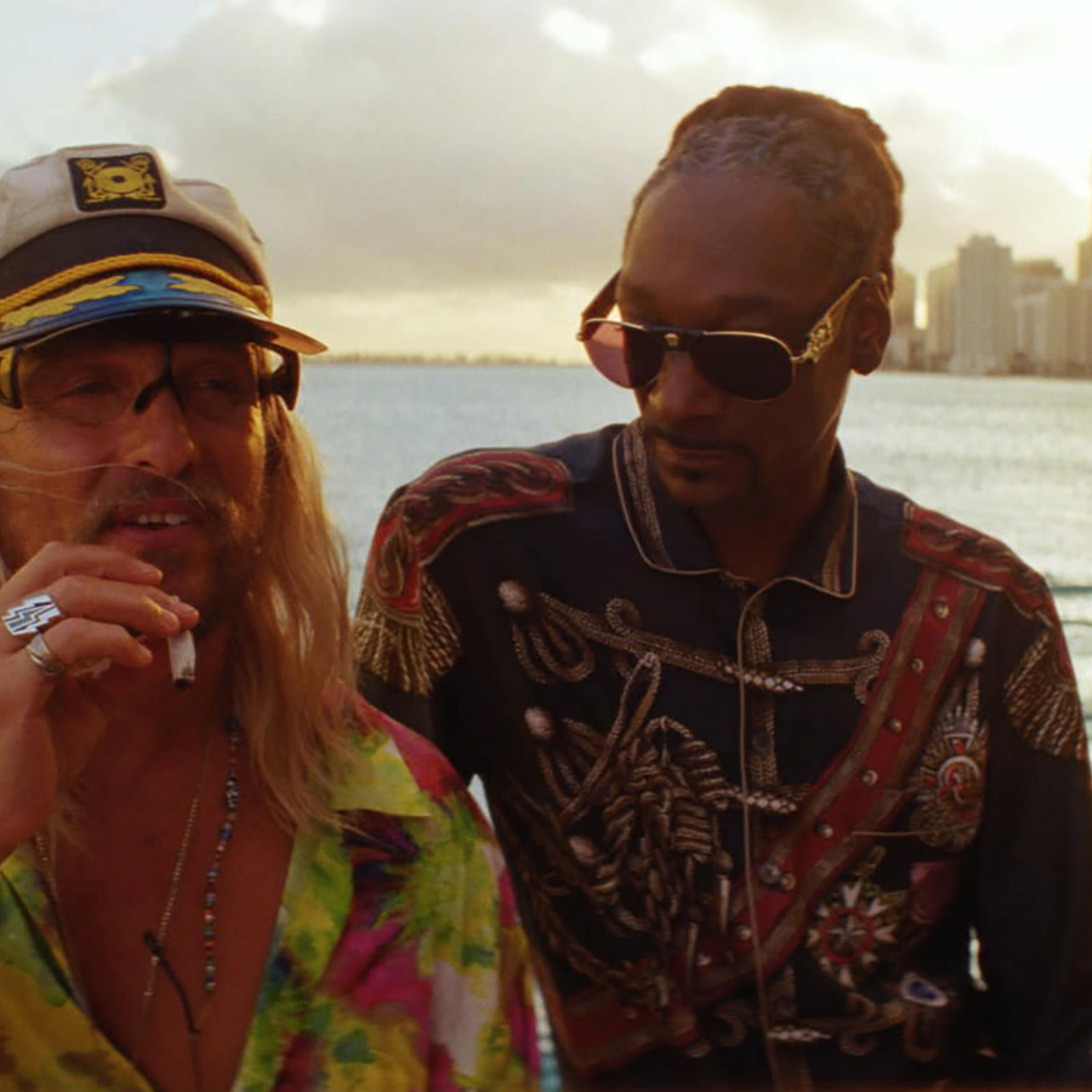 McConaughey mugs with rapper friend Lingerie, played by none other than Snoop Dogg