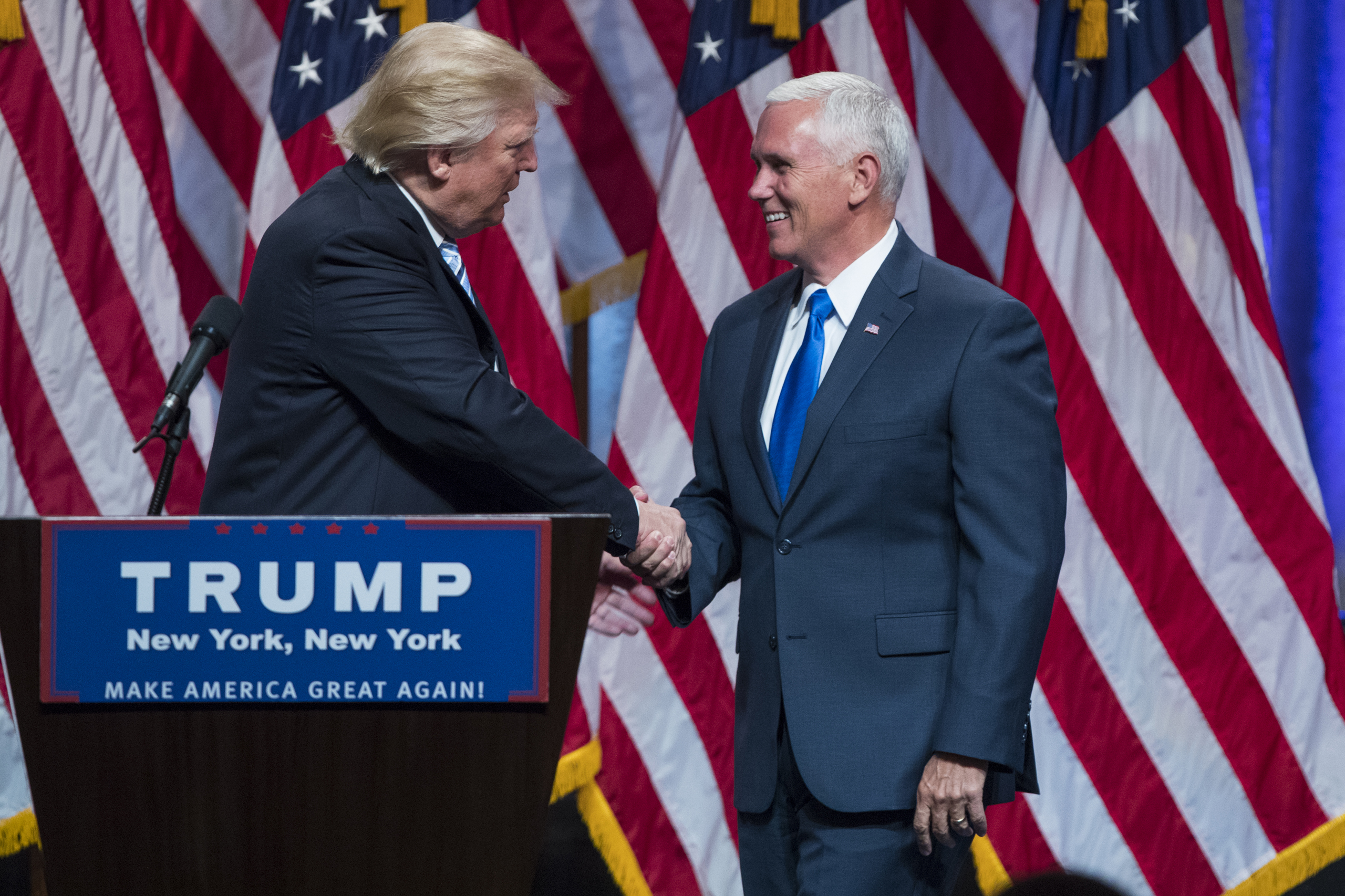 Republican presidential candidate Donald Trump, right, introduces Gov. Mike Pence, R-Ind., during a campaign event to announce Pence as the vice presidential running mate in New York City on July 16, 2016.