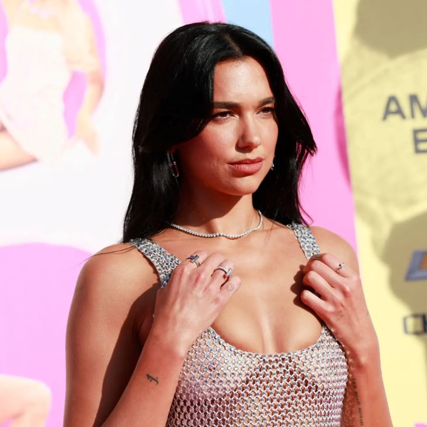 Dua Lipa on the red carpet of the Barbie premiere