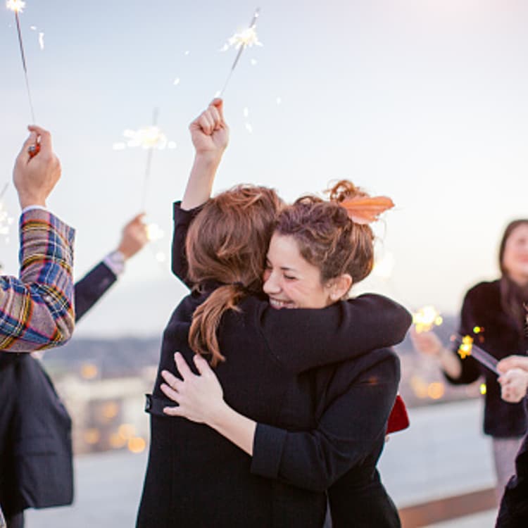 friends-hugging-celebrating