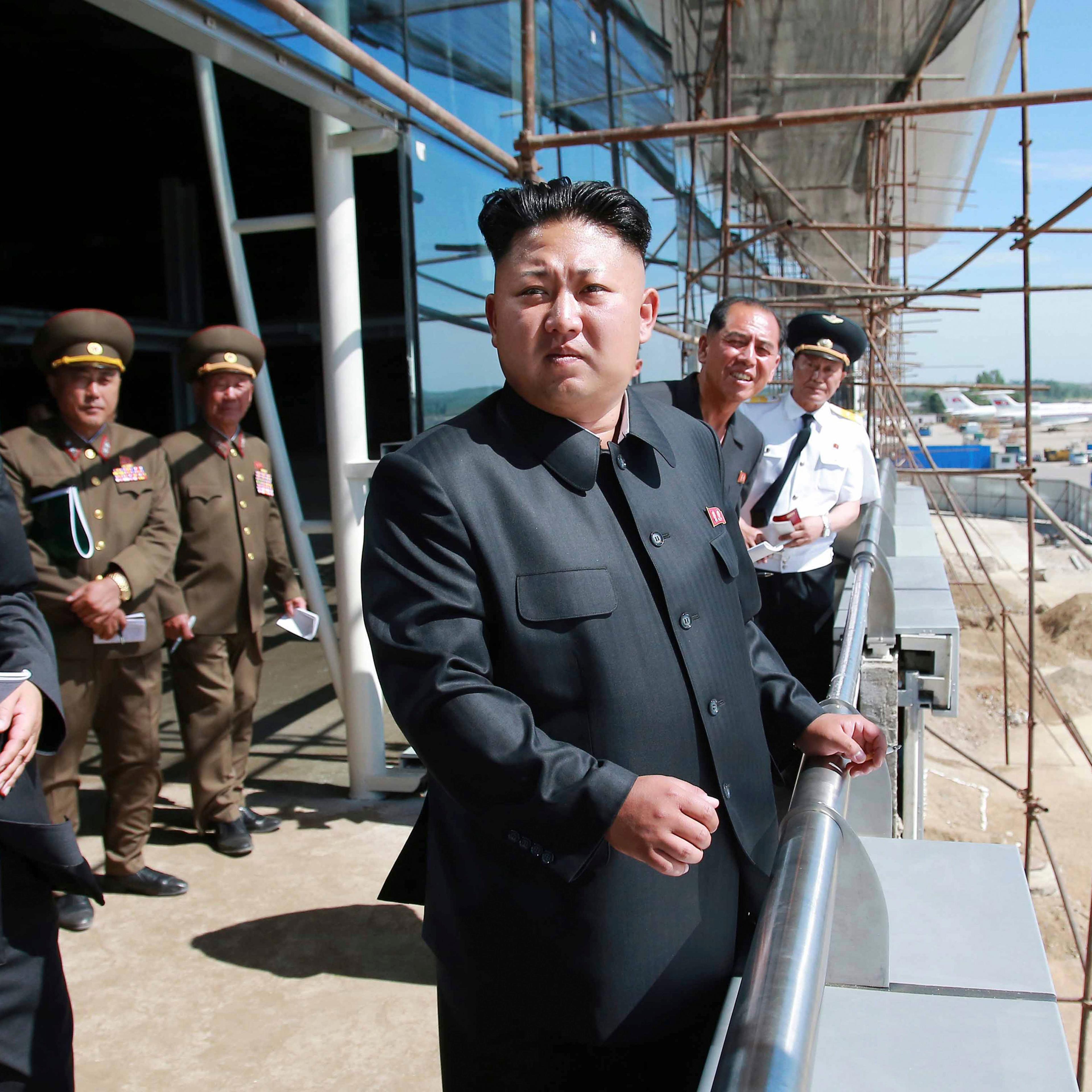 KCNA picture shows North Korean leader Kim Jong Un during a visit to the construction site of a terminal at Pyongyang International Airport