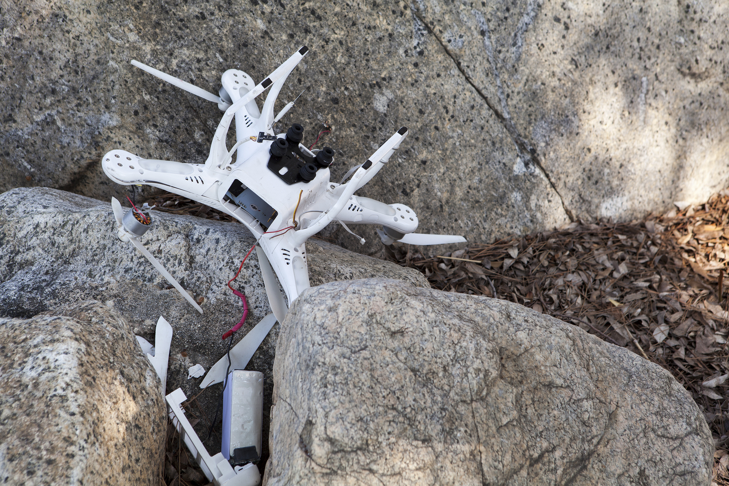 Crashed Drone Among Rocks