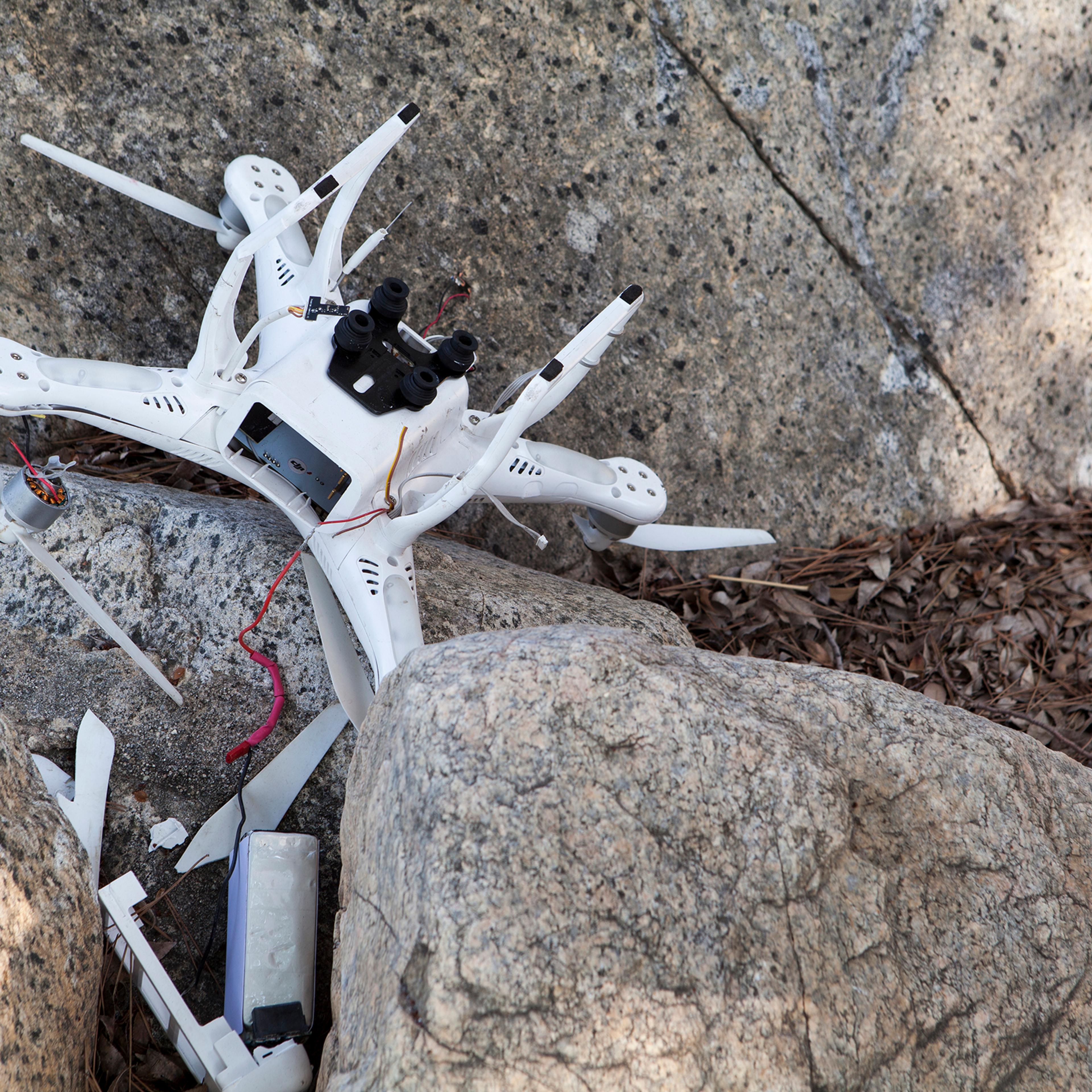 Crashed Drone Among Rocks