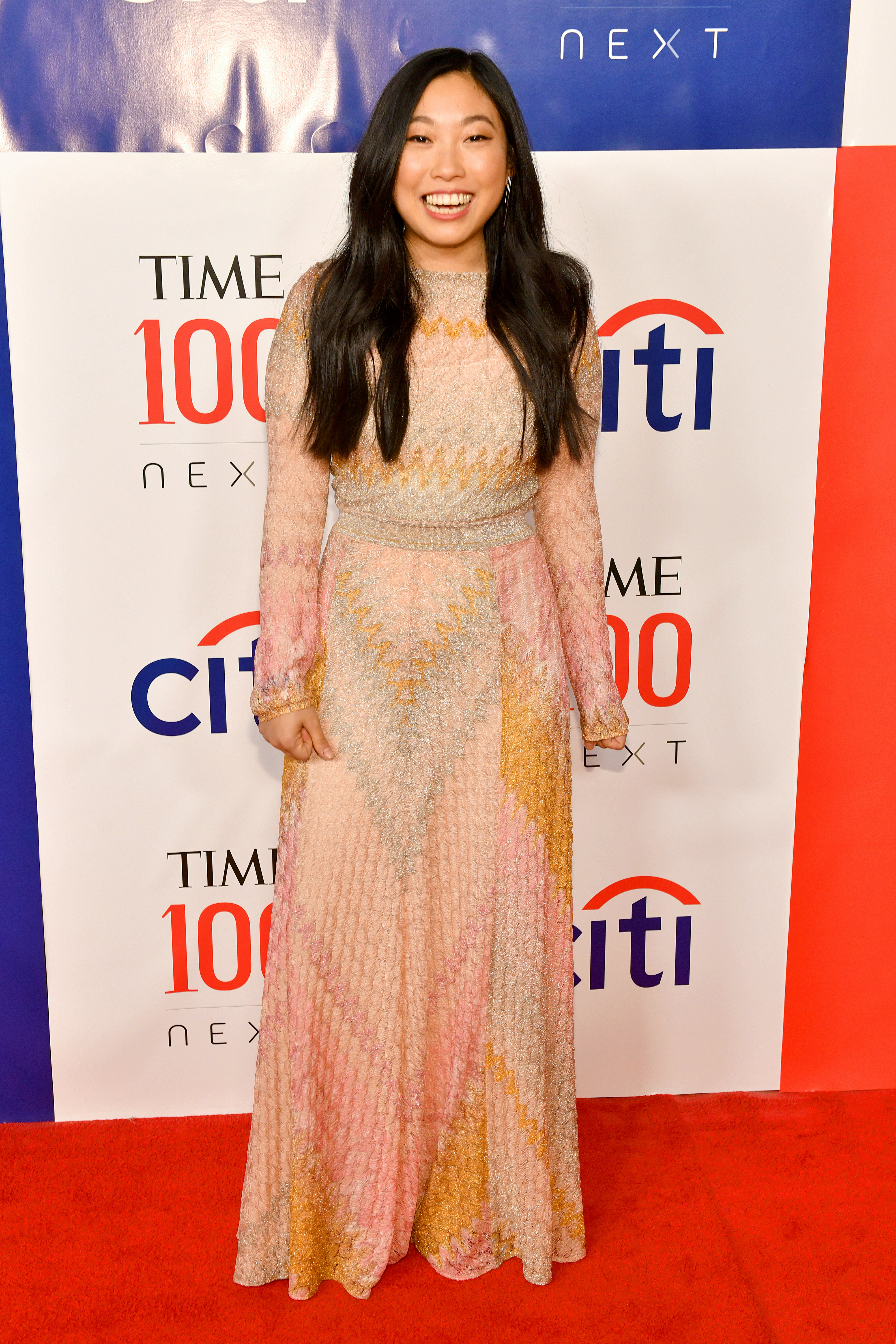 awkwafina gold dress New York, NY - May 06, 2019: Awkwafina arrives for the 2019 Met Gala  celebrating Camp: Notes on Fashion at The Metropolitan Museum of Art Stock  Photo