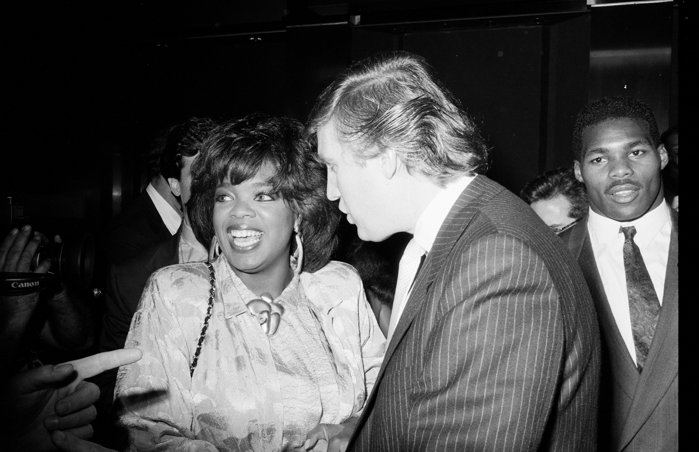 Oprah Winfrey and Donald Trump attending party after Tyson-Spinks fight