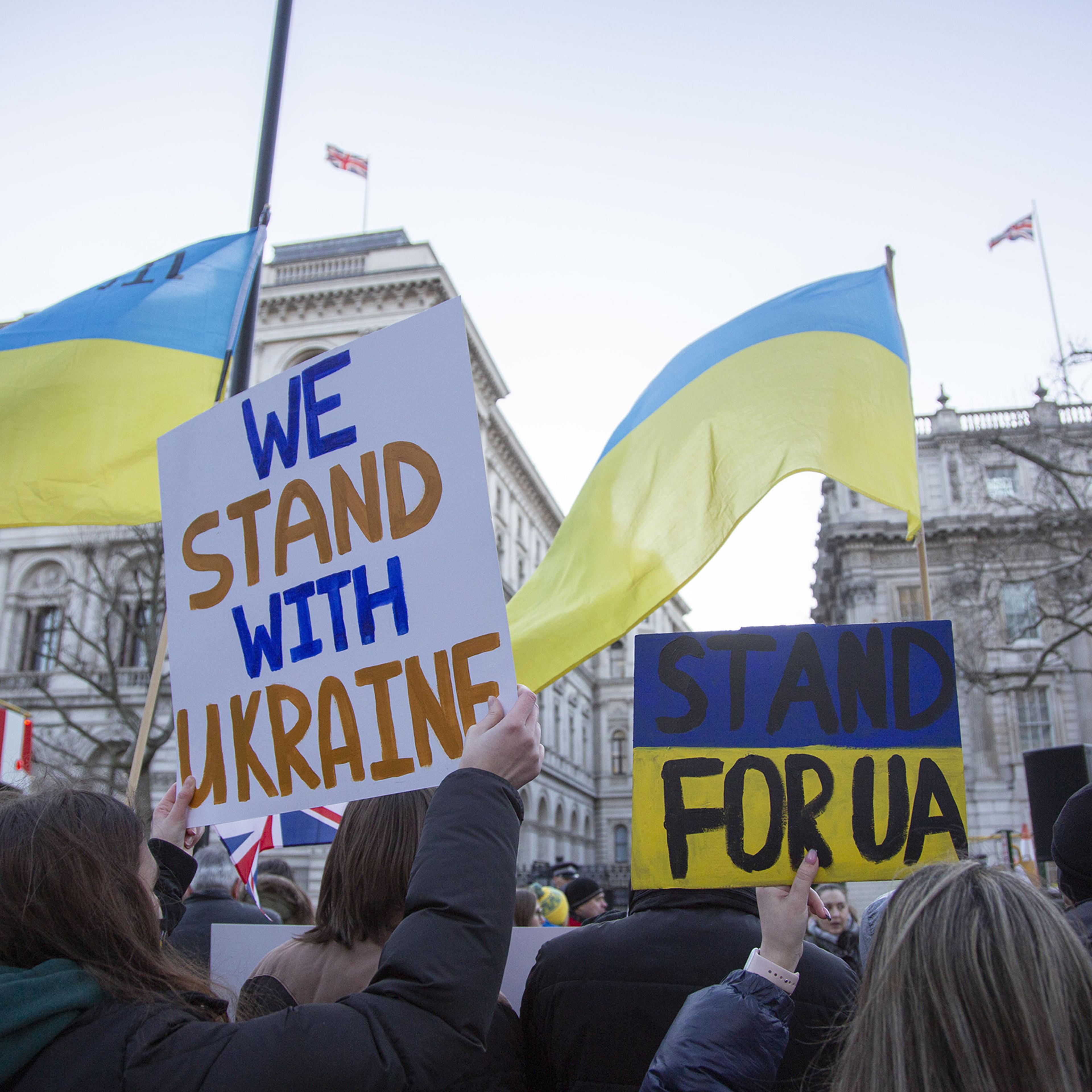 Anti-war demonstrators and Ukrainians living in the U.K., gather around 10 Downing Street in London to protest against Russia's military operation in Ukraine, on Feb. 24, 2022.