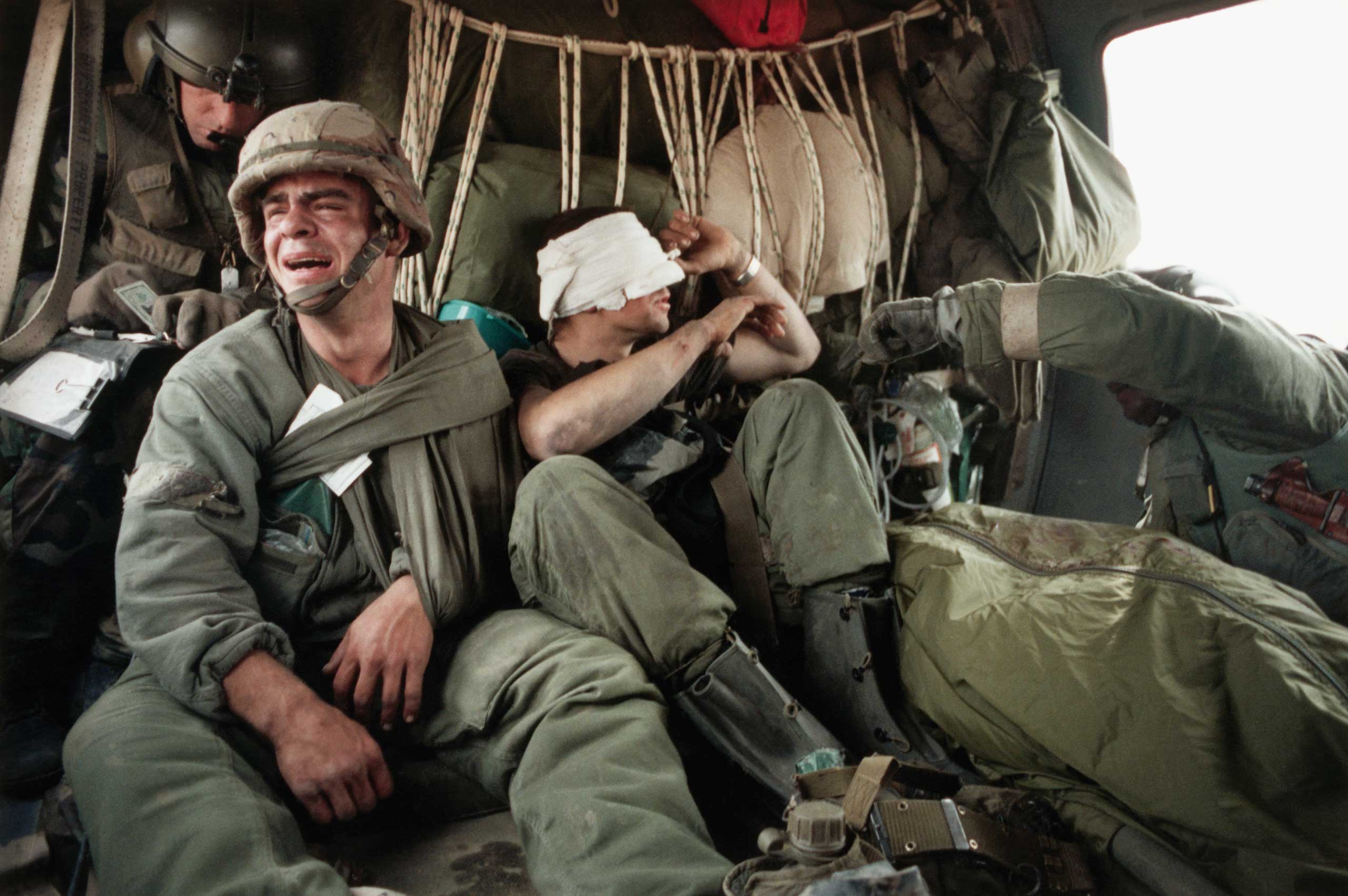 American Soldier Grieving for Comrade