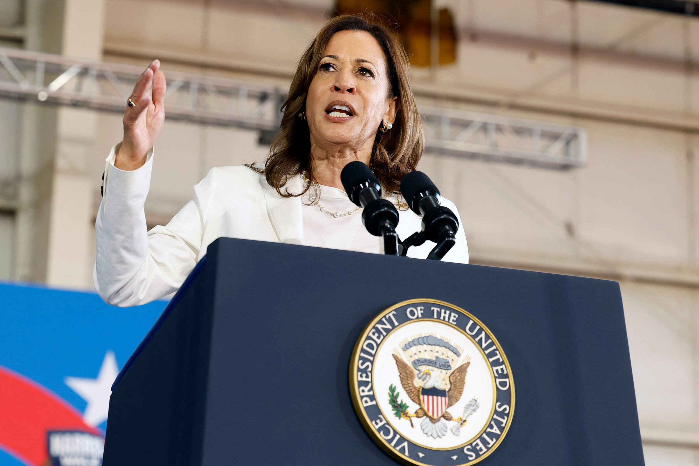 U.S Vice President and Democratic presidential candidate Kamala Harris speaks during a campaign rally at Detroit Metropolitan Airport in Romulus, Michigan, August 7, 2024. 