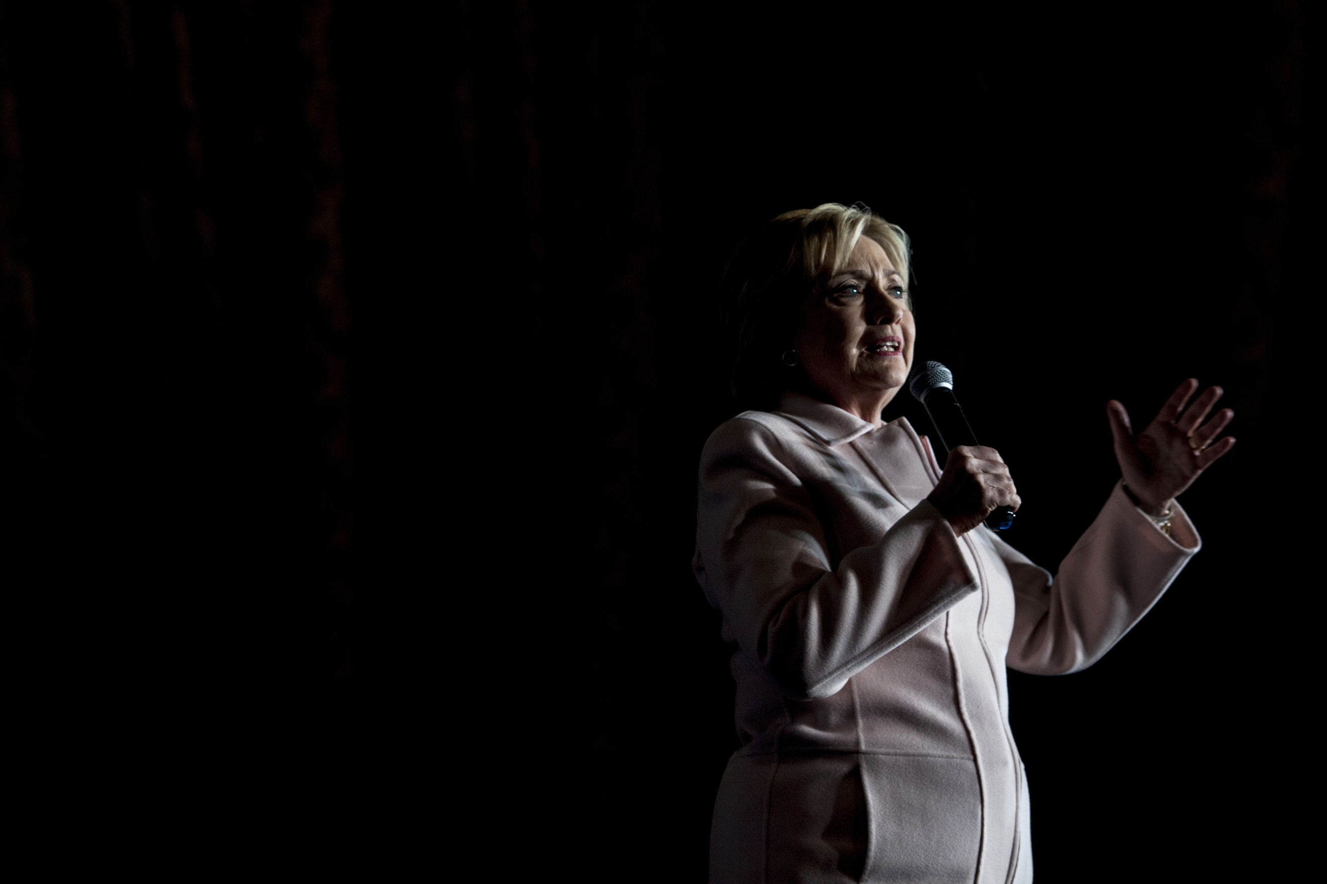 Hillary Clinton speaks during a campaign rally with husband Bill Clinton in Davenport, Iowa on Jan. 29, 2016.