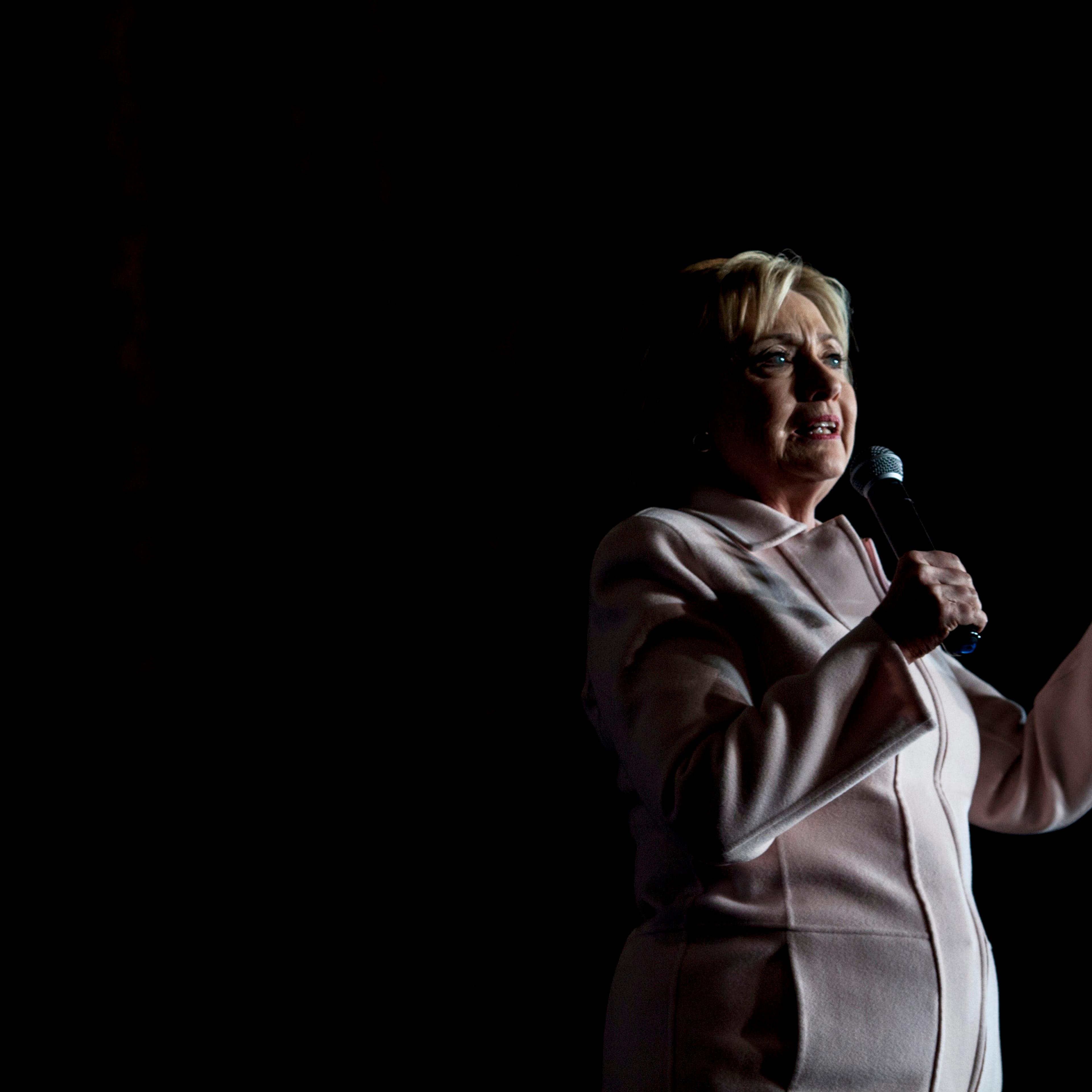 Hillary Clinton speaks during a campaign rally with husband Bill Clinton in Davenport, Iowa on Jan. 29, 2016.