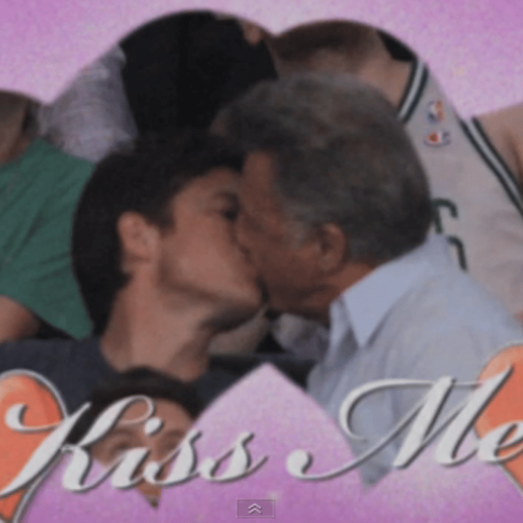 Dustin Hoffman and Jason Bateman kiss on camera at a Lakers game