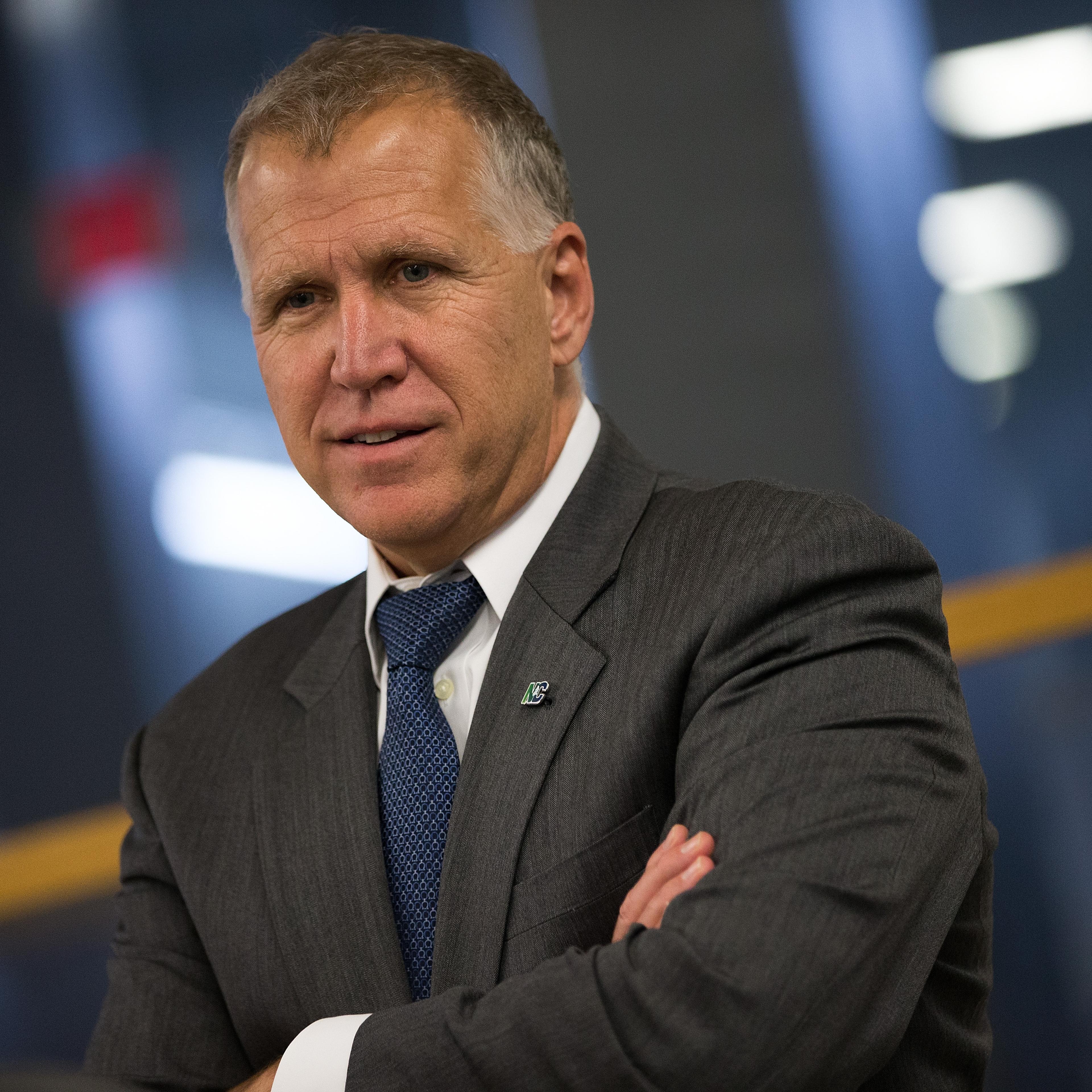Sen. Thom Tillis speaks with an aide after a vote at the U.S. Capitol in Washington, D.C., on May 9, 2016.