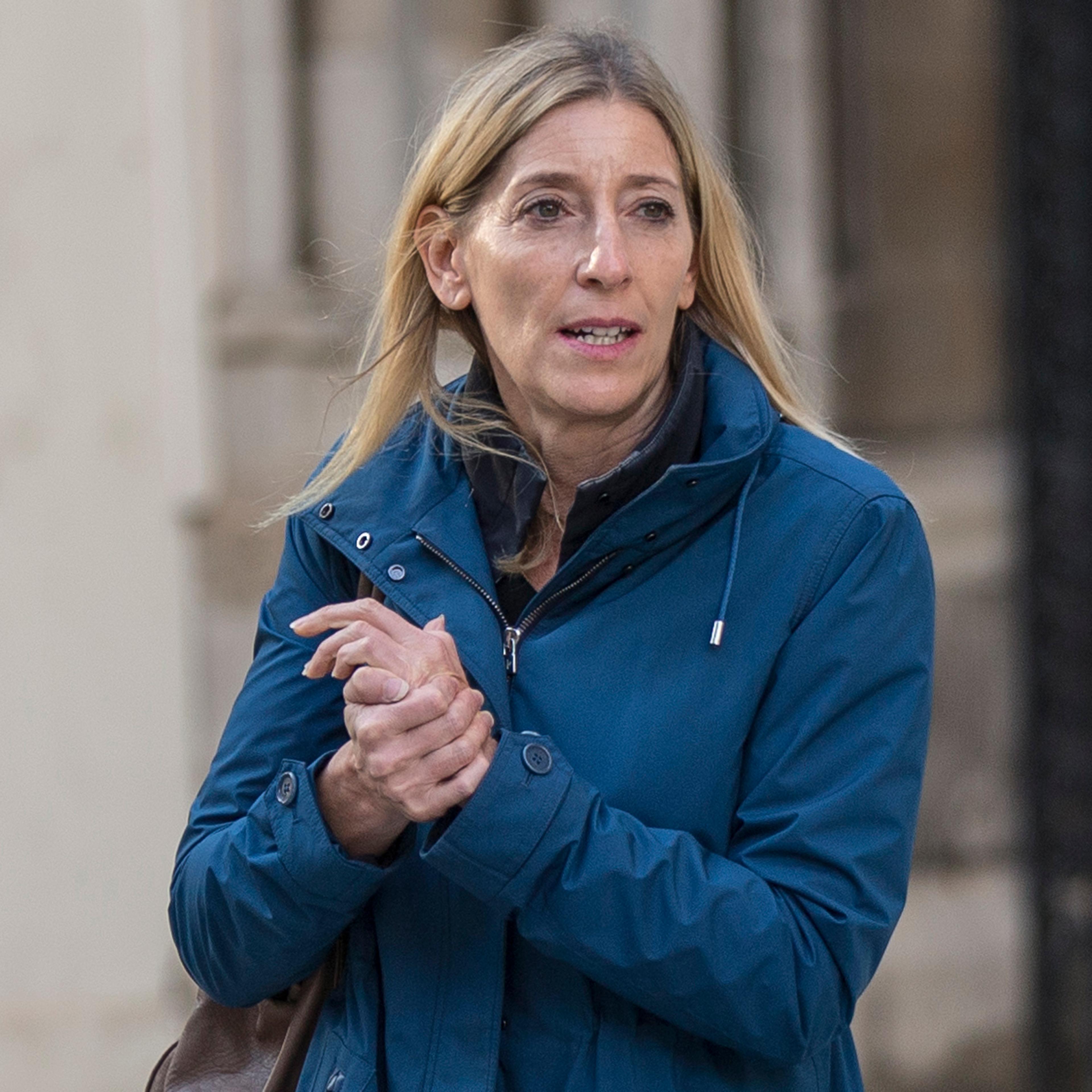 Jamie Cooper-Hohn, wife of top hedge fund boss Chris Hohn, leaves the High Court after a divorce hearing, in central London