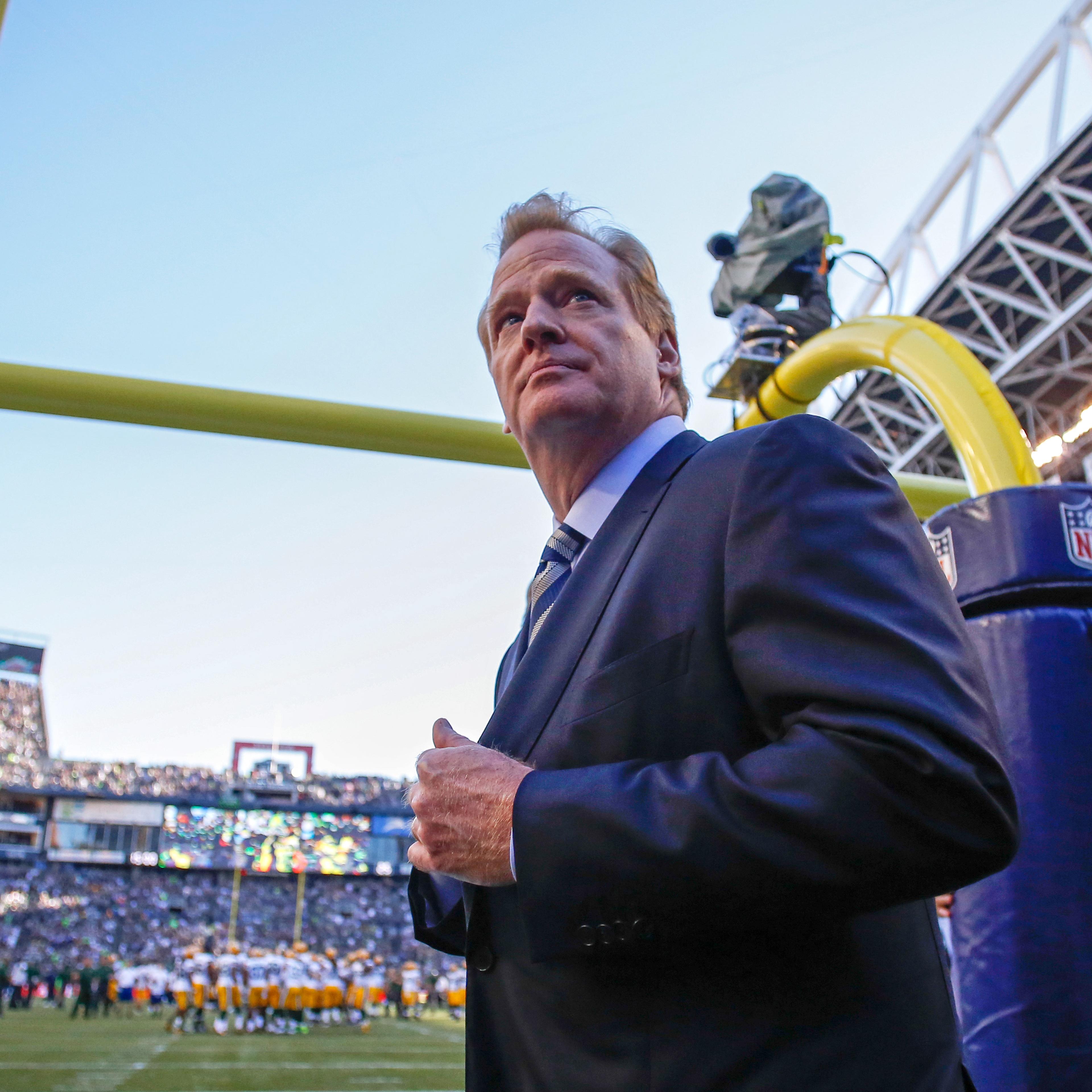 NFL commissioner Roger Goodell walks the sidelines prior to the game between the Seattle Seahawks and the Green Bay Packers at CenturyLink Field on September 4, 2014 in Seattle, Washington.