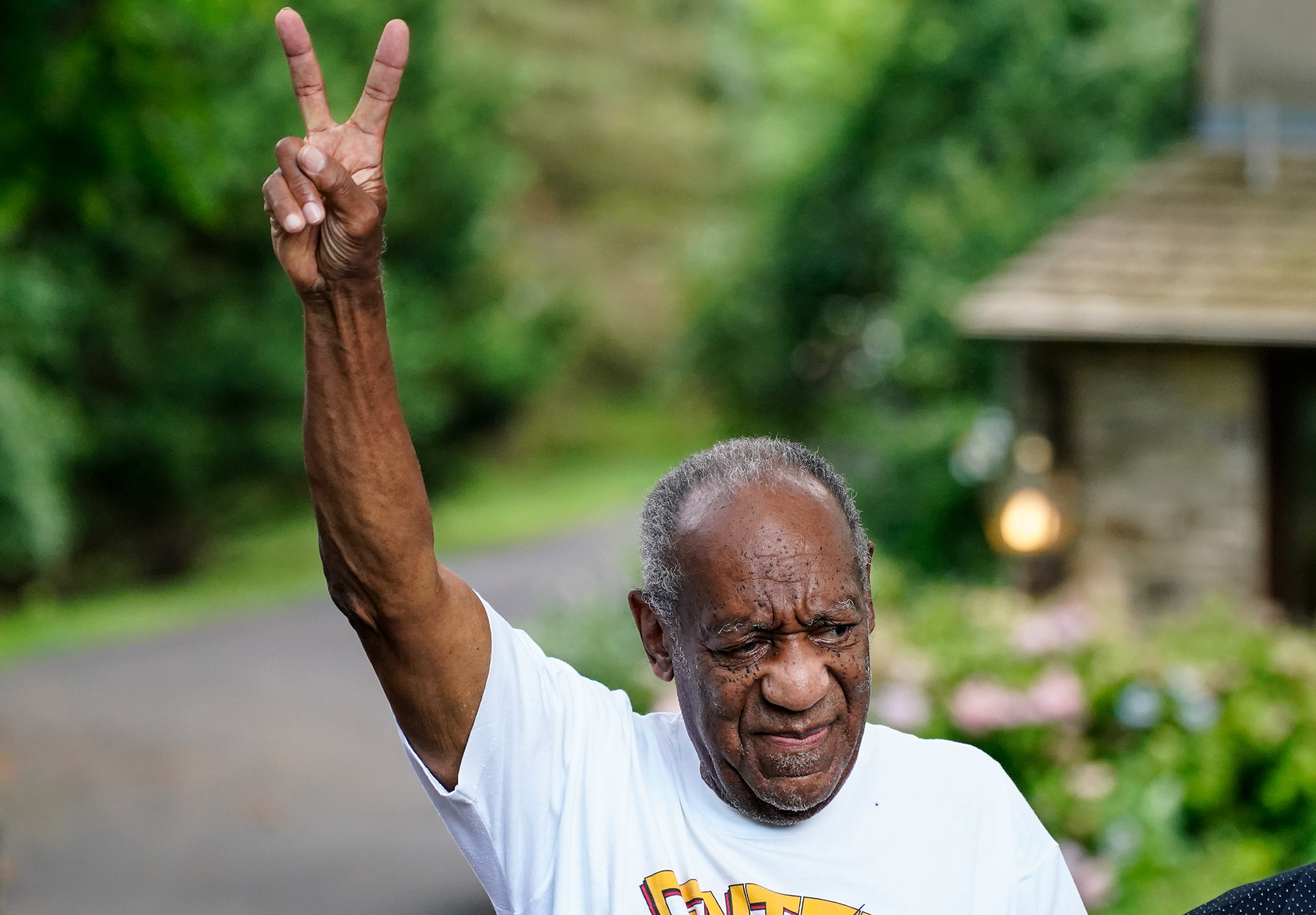 Bill Cosby gestures outside his home in Elkins Park, Pa. on June 30 after being released from prison.