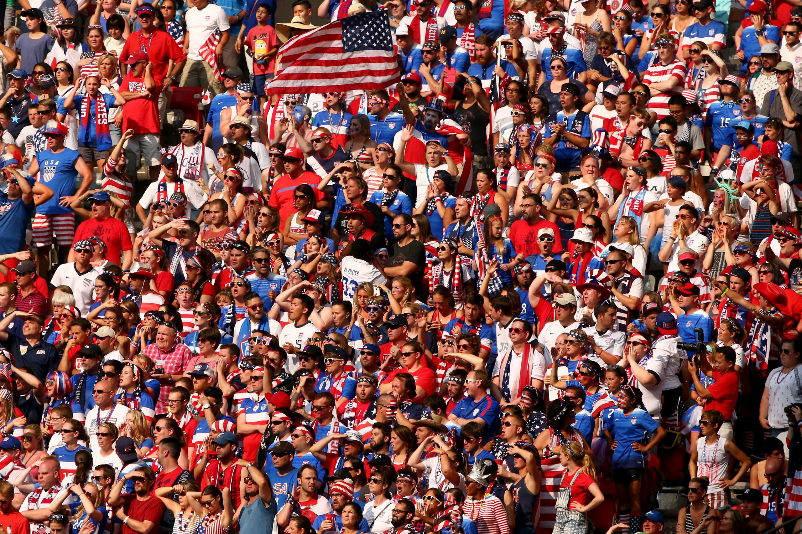 VANCOUVER, BC - JULY 05: Fans cheer in the second half between the United States and Japan in the FIFA Women's World Cup Canada 2015 Final at BC Place Stadium on July 5, 2015 in Vancouver, Canada. (Photo by Ronald Martinez/Getty Images)