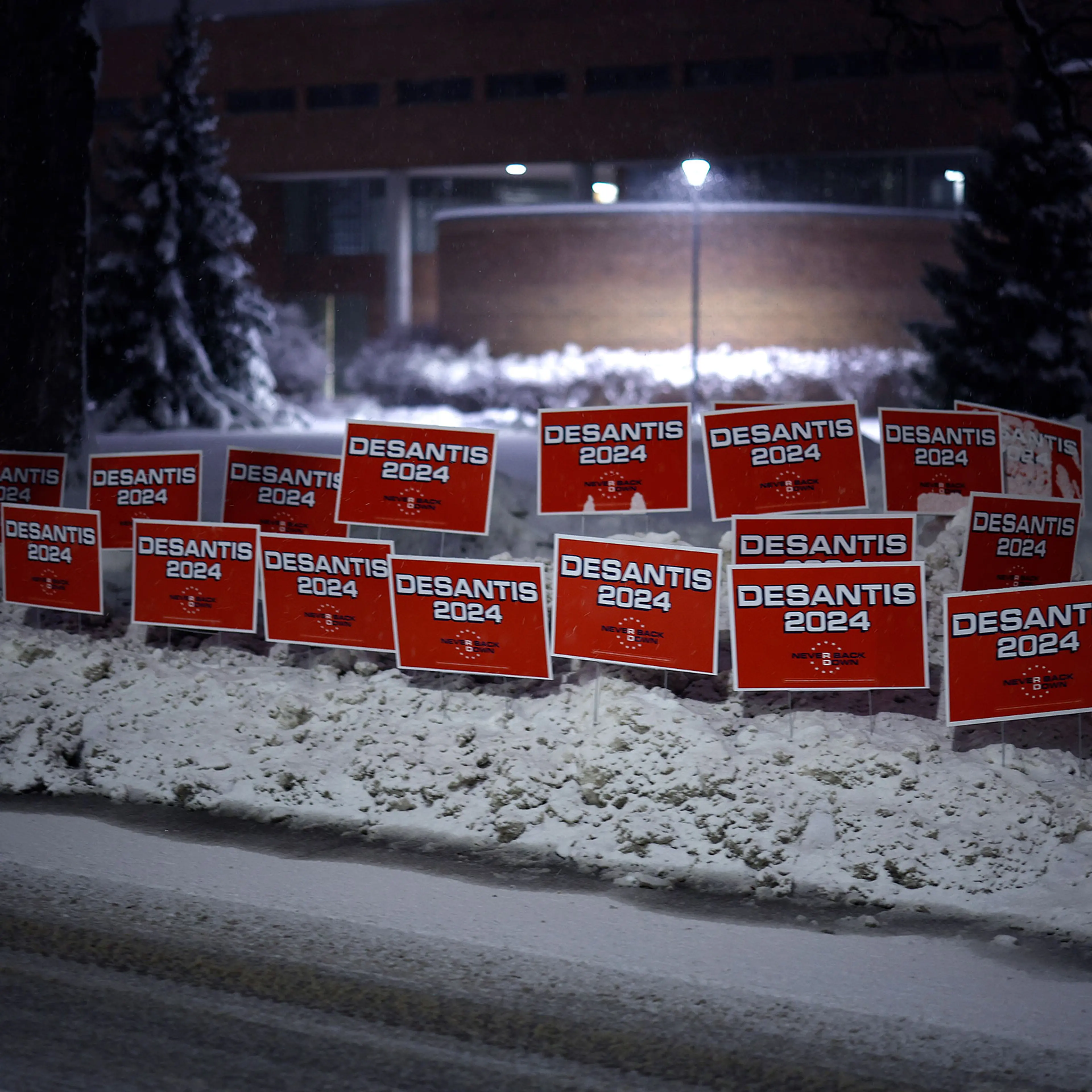 Campaign signs for Florida Gov. Ron Desantis line the road in front of Drake University, where CNN is hosting a presidential debate in Des Moines on Jan. 10, 2024.