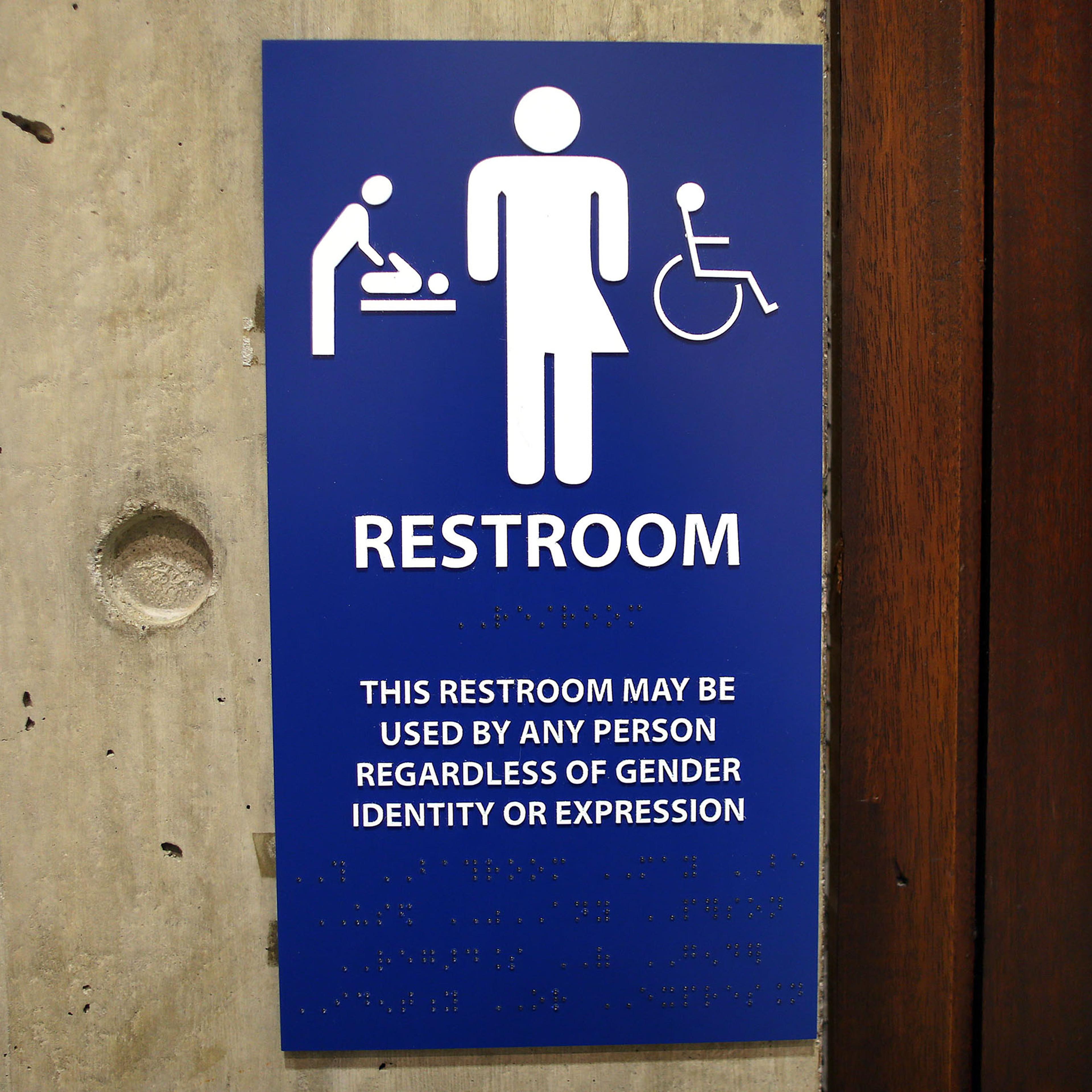 The sign for the gender-neutral bathrooms on the 5th floor of Boston City Hall across from the reception area for the Mayor's office, May 15, 2016.