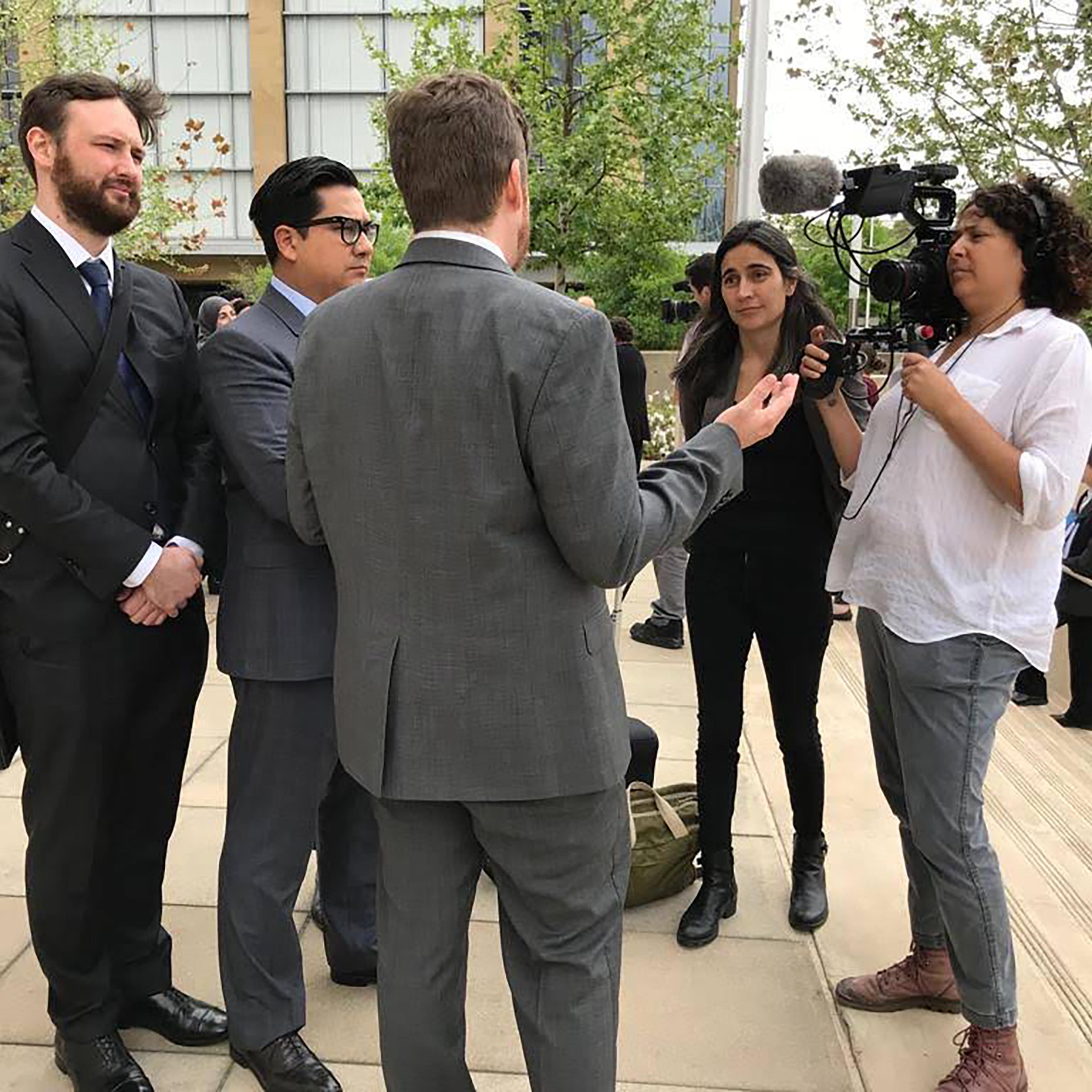 Julia Bacha and cinematographer Amber Fares interviewing ACLU lawyers outside the courtroom in Austin, Texas