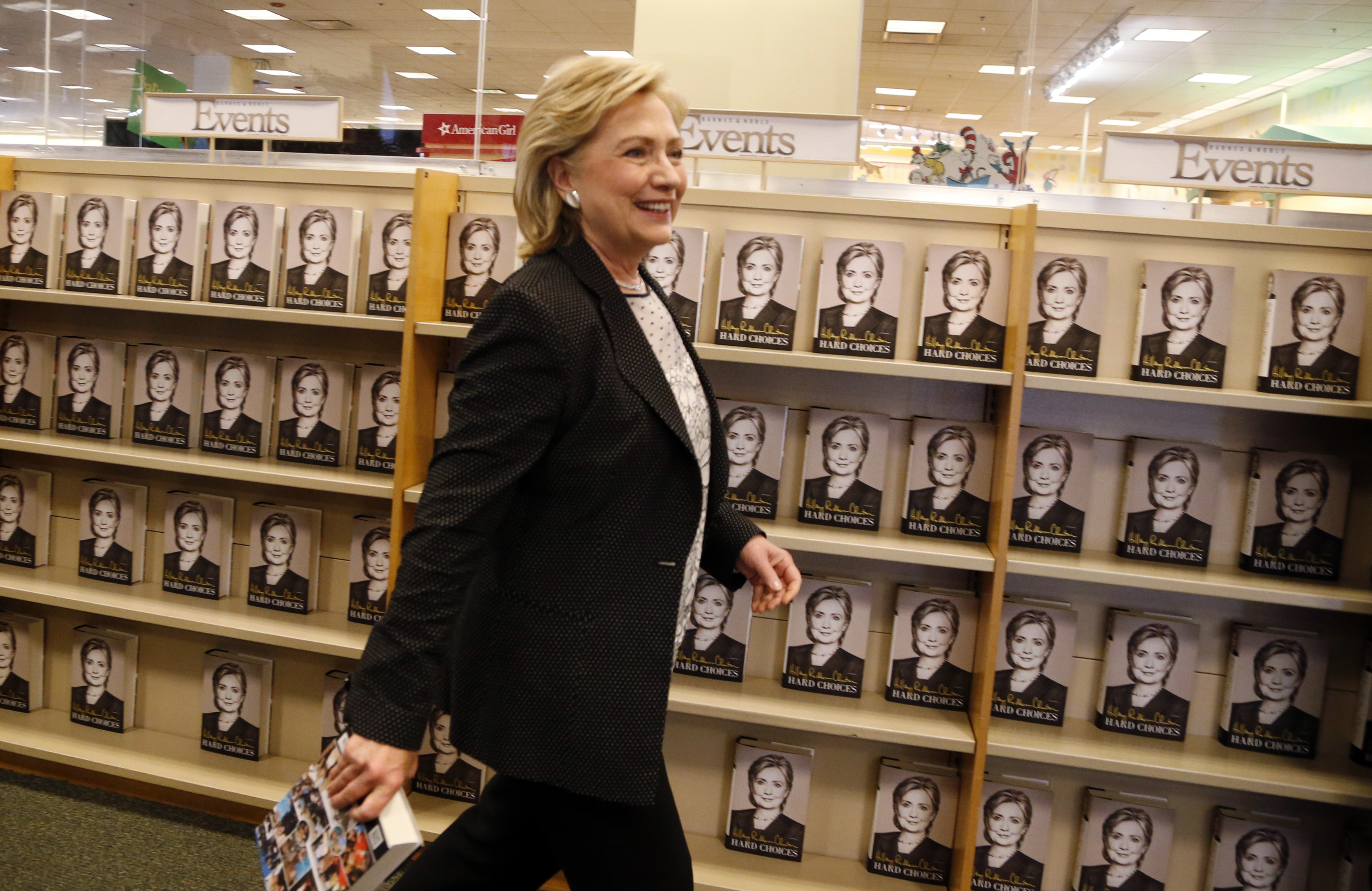 Former U.S. Secretary of State Hillary Clinton arrives to sign copies of her book "Hard Choices" at a Barnes & Noble book store in Los Angeles