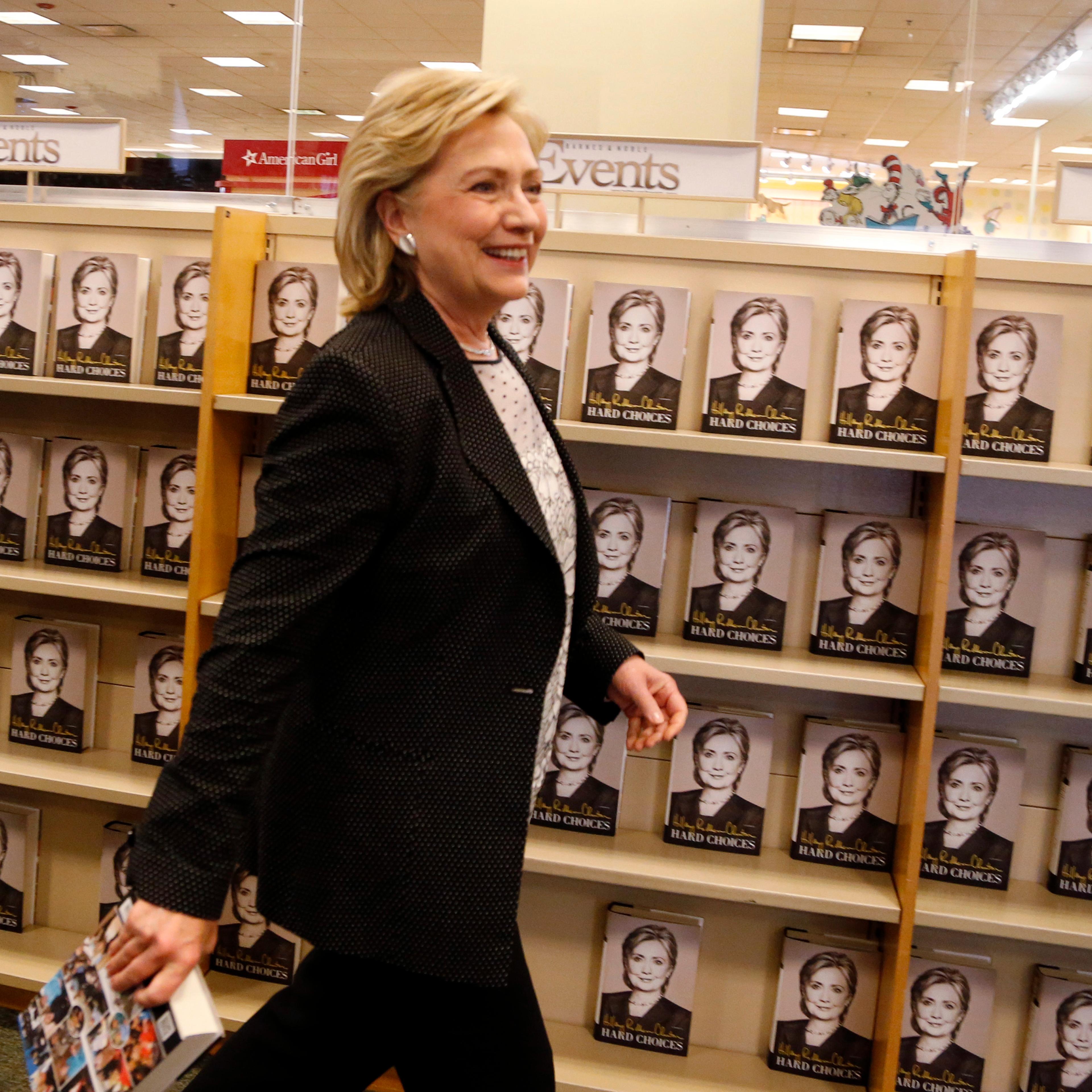 Former U.S. Secretary of State Hillary Clinton arrives to sign copies of her book "Hard Choices" at a Barnes & Noble book store in Los Angeles