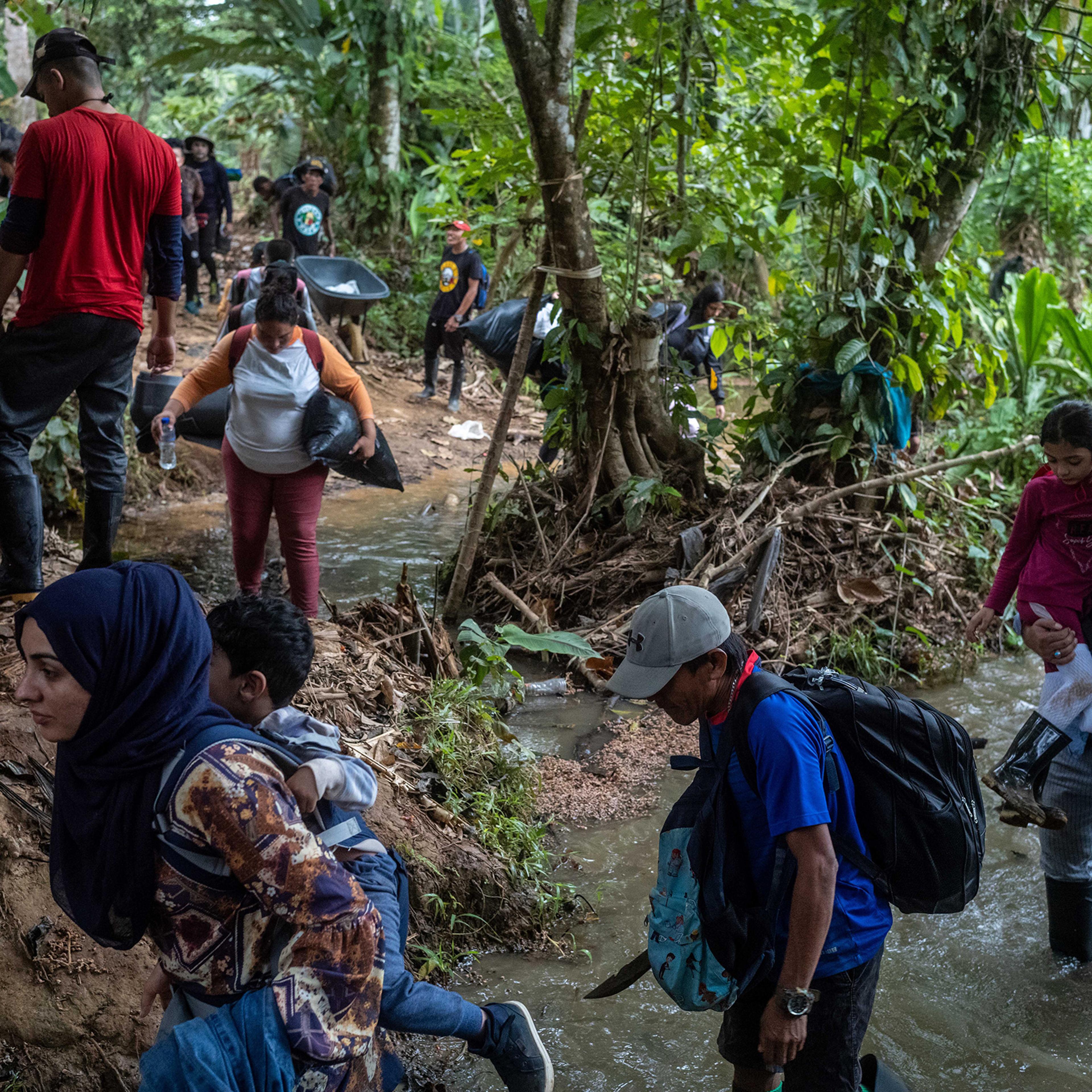 Afghan migrants walking in the jungle crossing the Darien Gap, in Panama, on March 6.