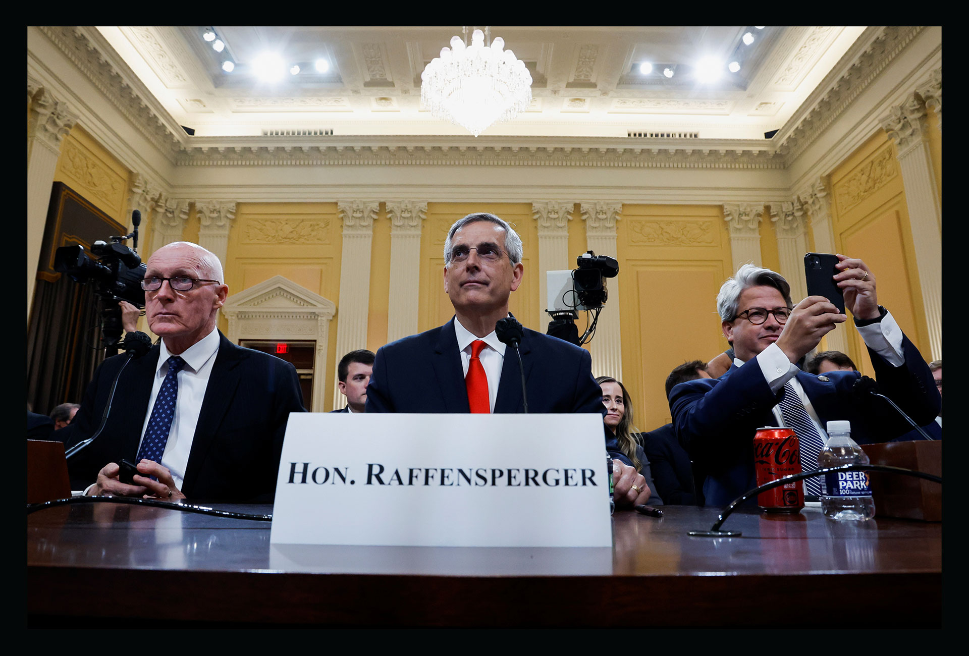 Georgia Secretary of State Brad Raffensperger sits between Arizona House Speaker Rusty Bowers and Georgia Secretary of State Chief Operating Officer Gabriel Sterling during the fourth public hearing of the U.S. House Select Committee to investigate the J