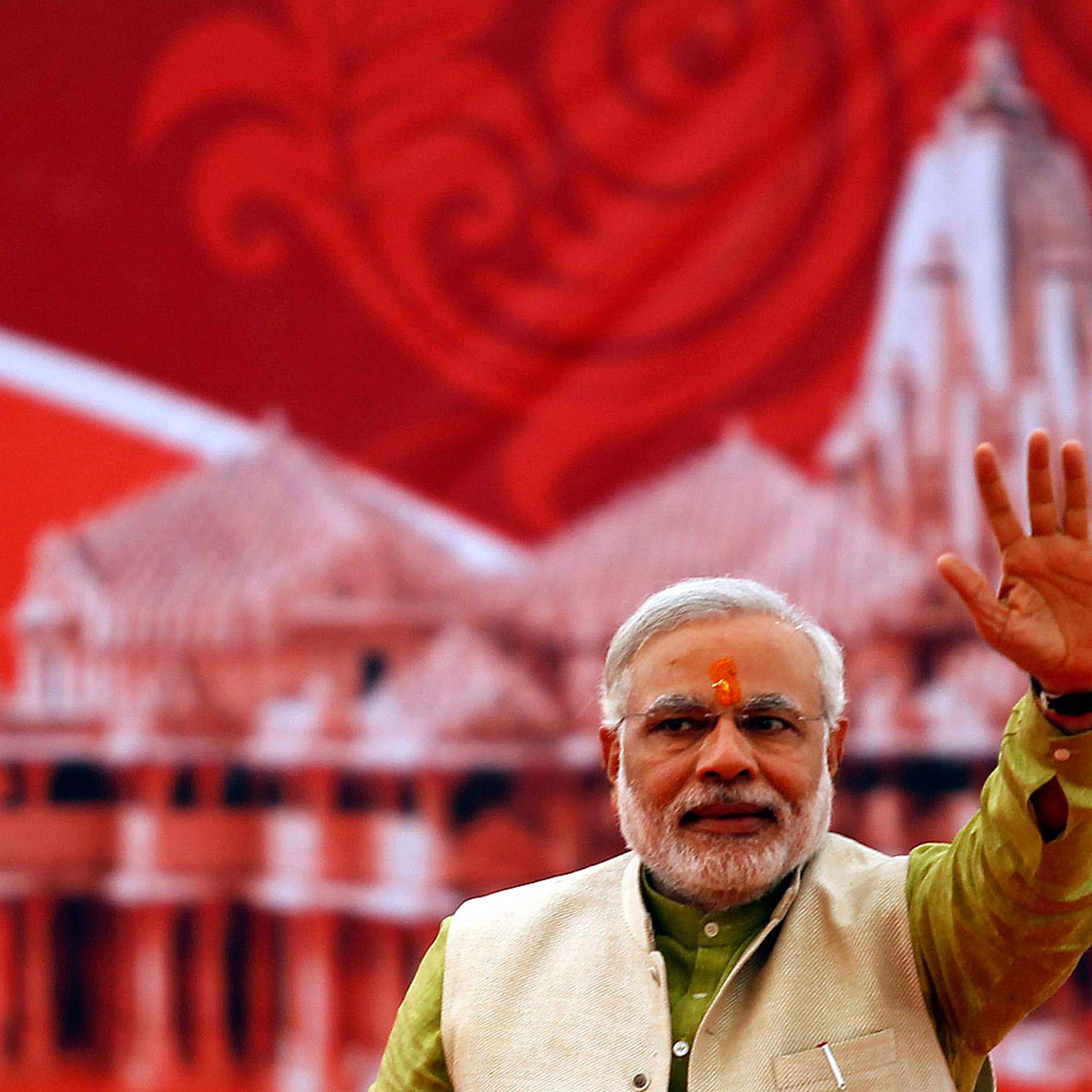Hindu nationalist Narendra Modi, prime ministerial candidate for India's main opposition Bharatiya Janata Party (BJP) and Gujarat's chief minister, waves to his supporters during a public meeting at Somnath in the western Indian state of Gujarat Feb. 1, 2014