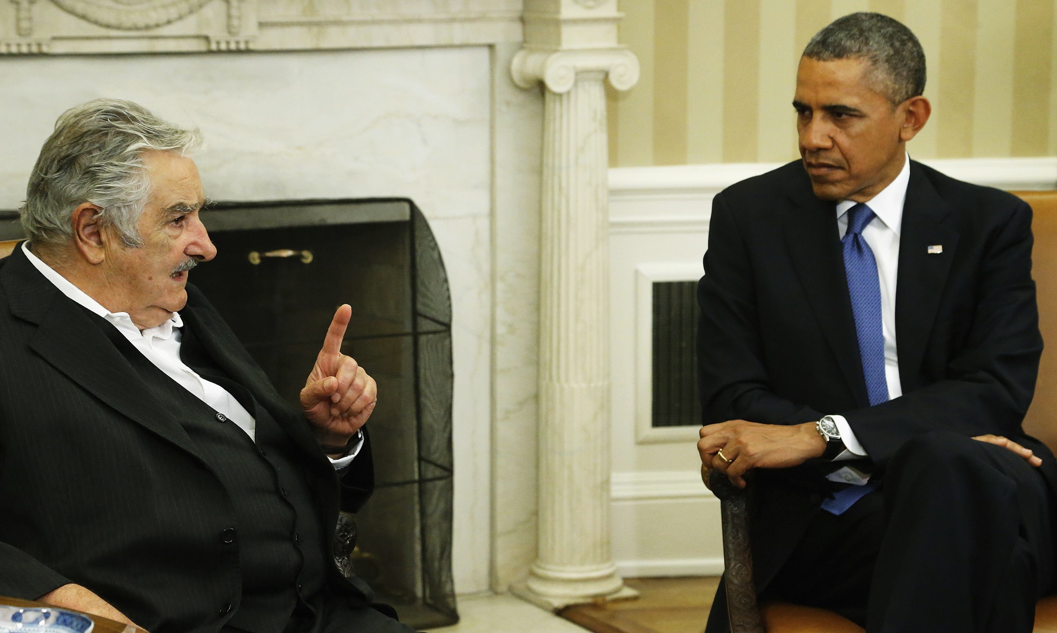 Uruguay's President Jose Mujica delivers remarks as U.S. President Barack Obama welcomes before meeting in Oval Office in Washington