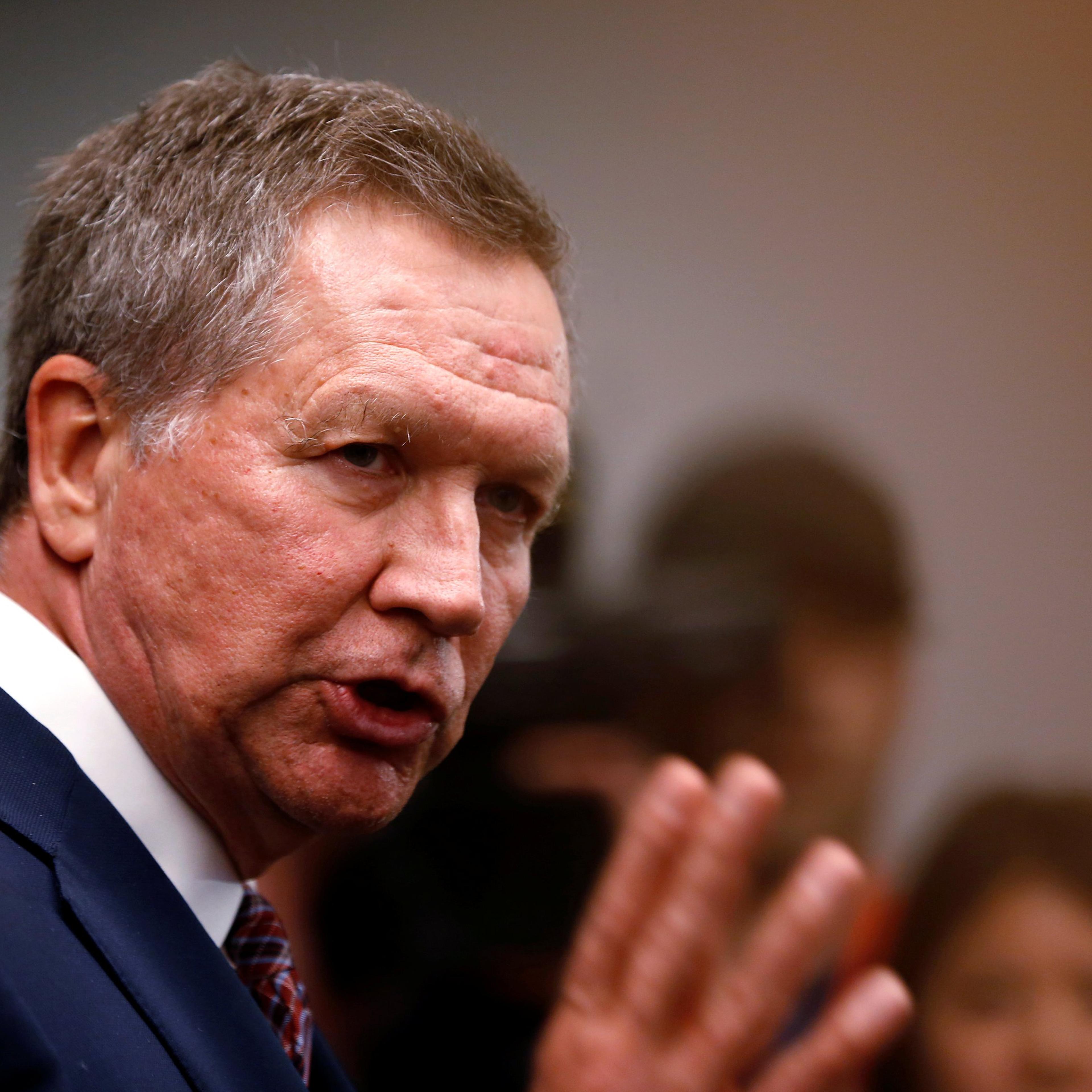 Republican U.S. presidential candidate John Kasich speaks to members of the media before speaking at the California GOP convention in Burlingame, California