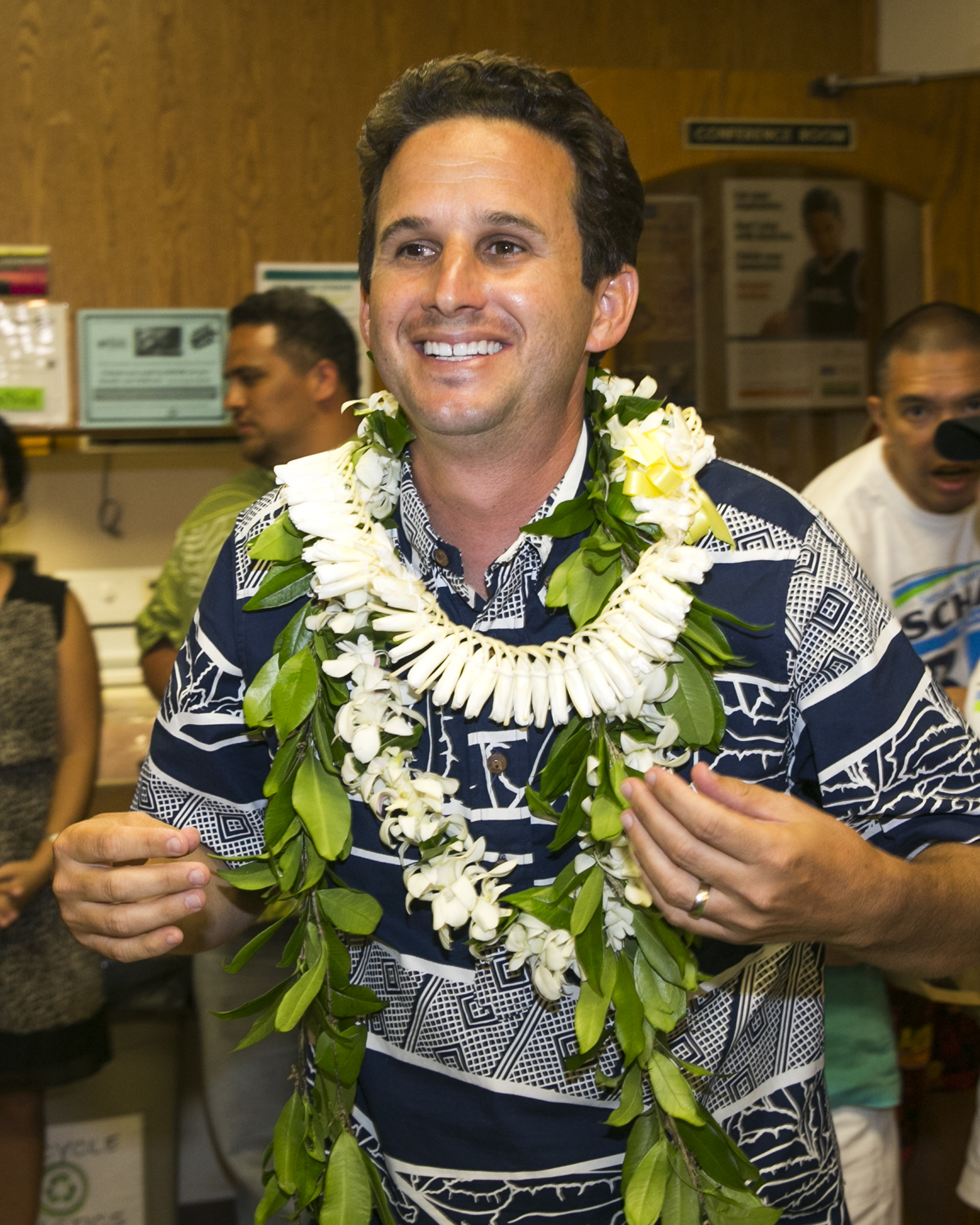 US Sen. Brian Schatz celebrates after defeating fellow Democrat Colleen Hanabusa to retain his senate seat on Aug. 15, 2014 in Hilo, Hawaii.