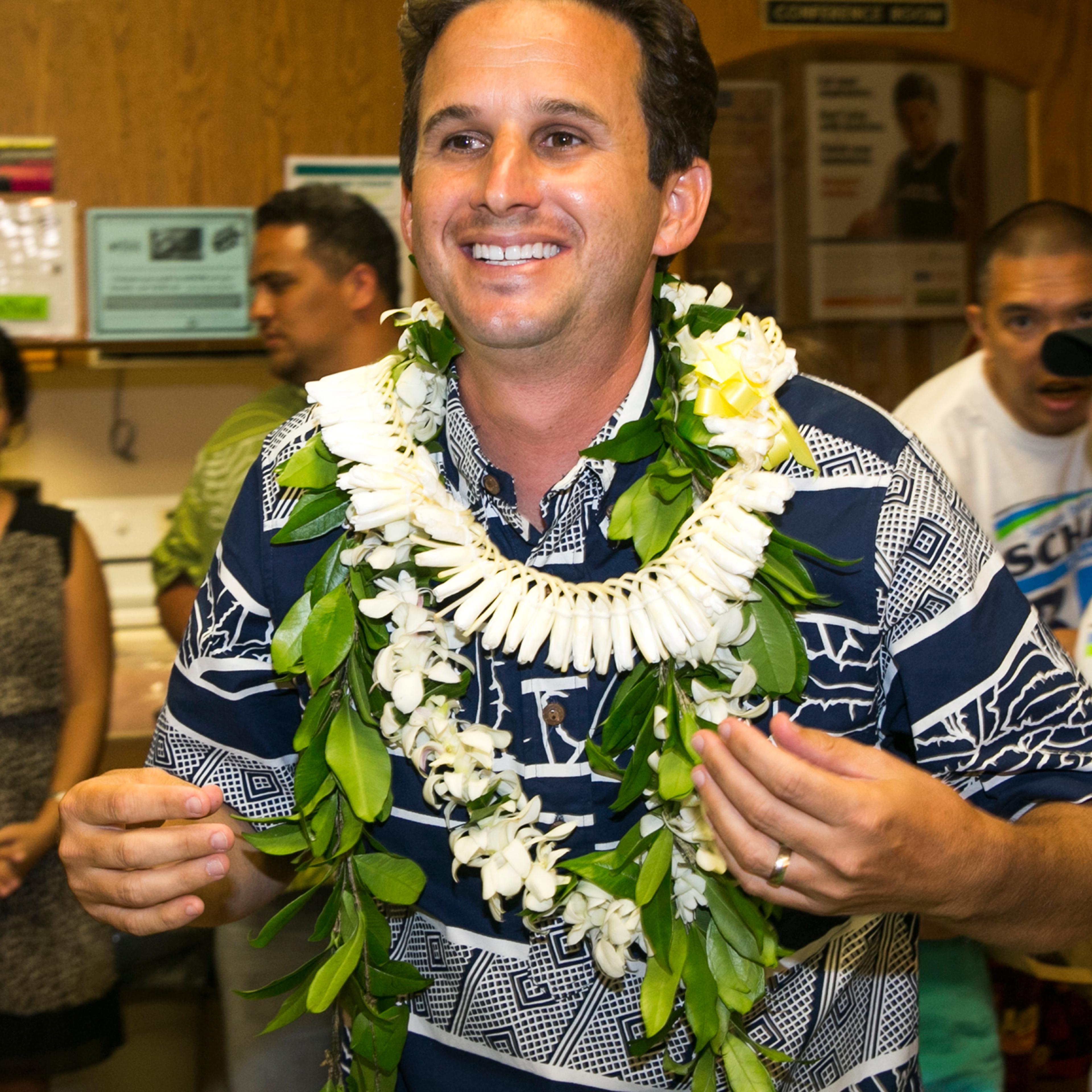 US Sen. Brian Schatz celebrates after defeating fellow Democrat Colleen Hanabusa to retain his senate seat on Aug. 15, 2014 in Hilo, Hawaii.