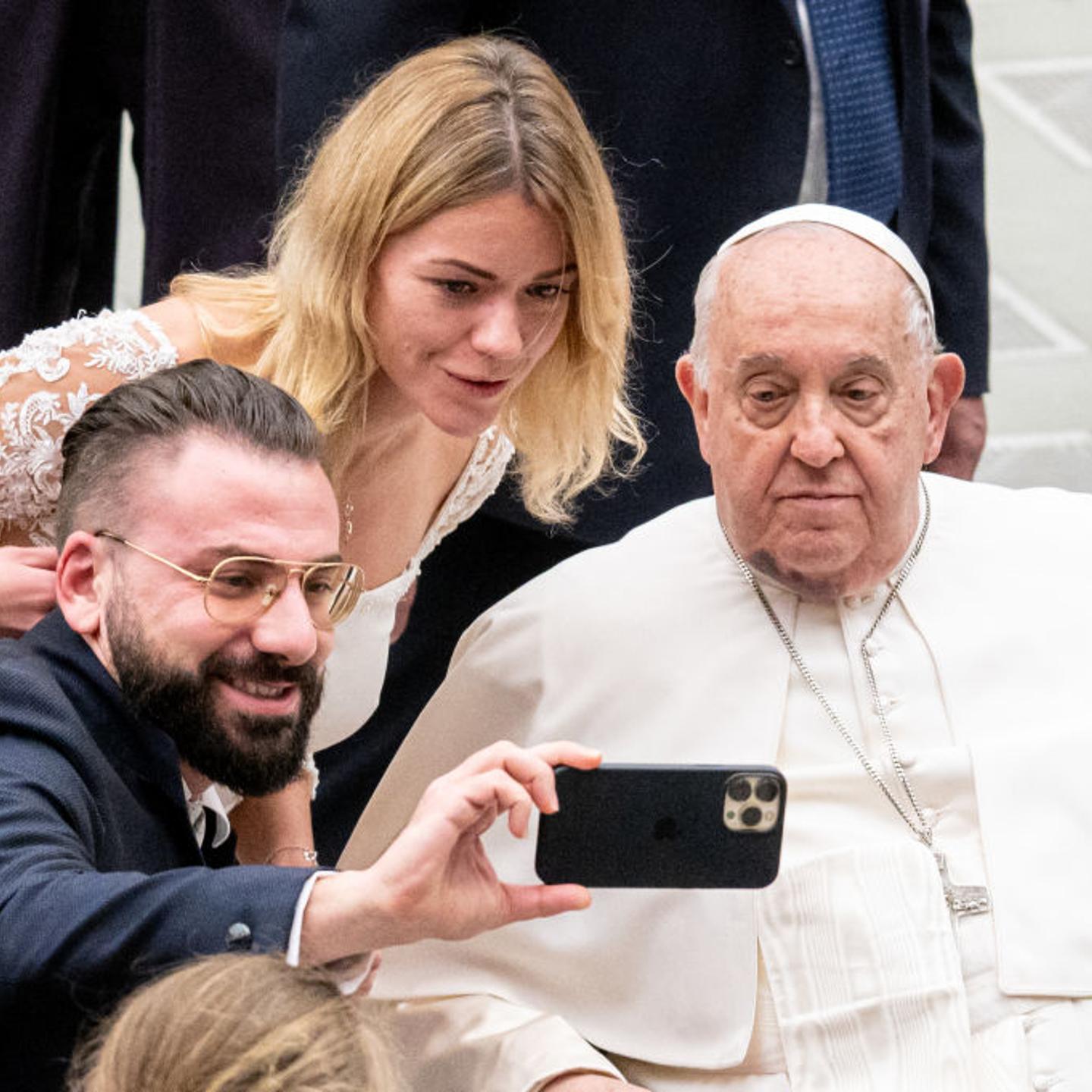 Pope Francis takes a selfie during his weekly general audience