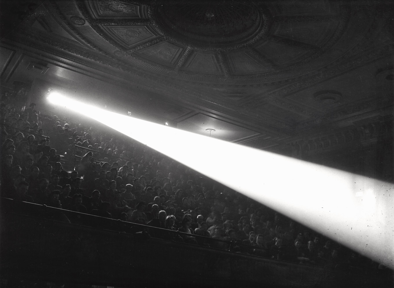 <em>Saturday afternoon show for the youngsters at Loew's Commodore Theater on Second Avenue… Some of the kids brought lunch… lolly pops…</em> ca. 1945