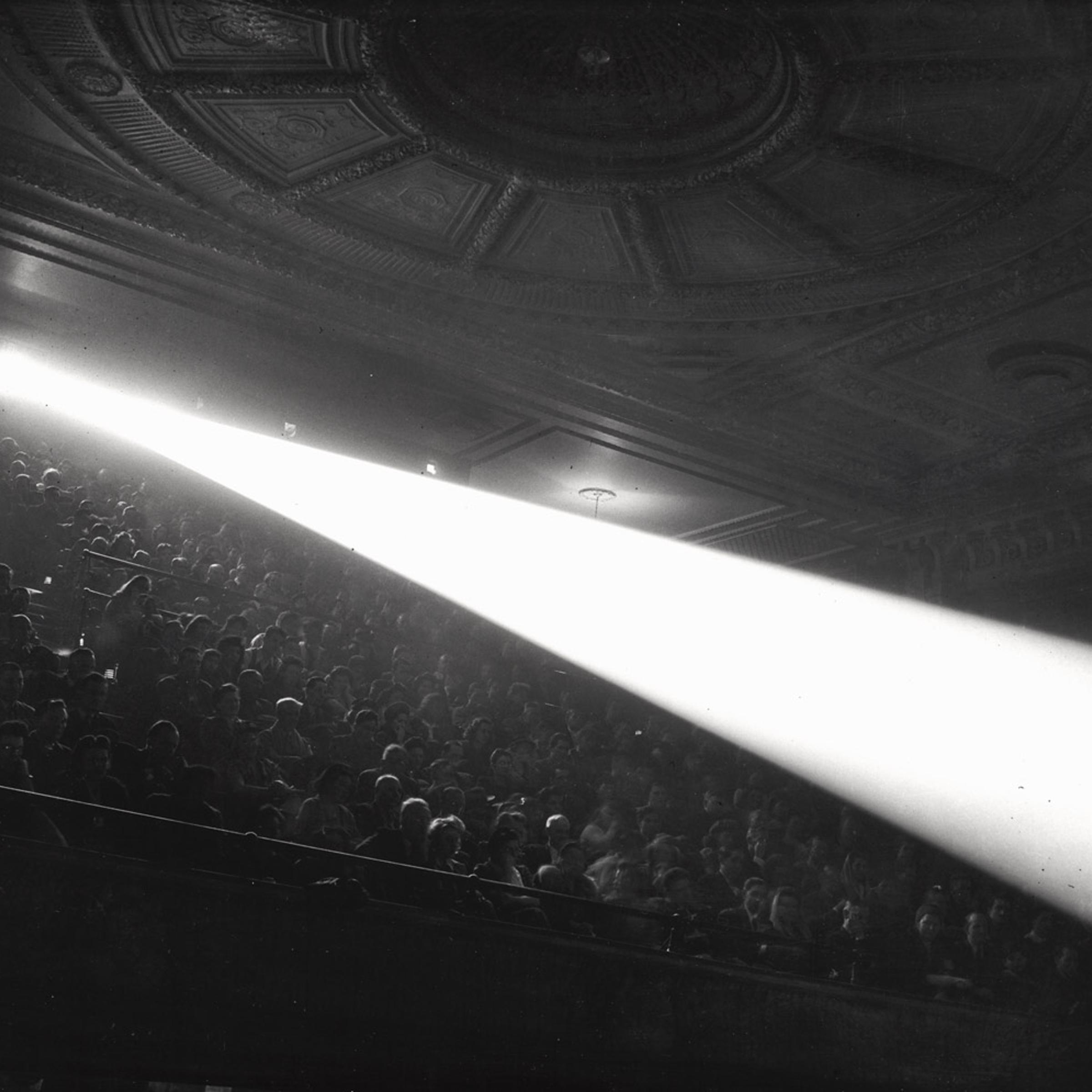 <em>Saturday afternoon show for the youngsters at Loew's Commodore Theater on Second Avenue… Some of the kids brought lunch… lolly pops…</em> ca. 1945