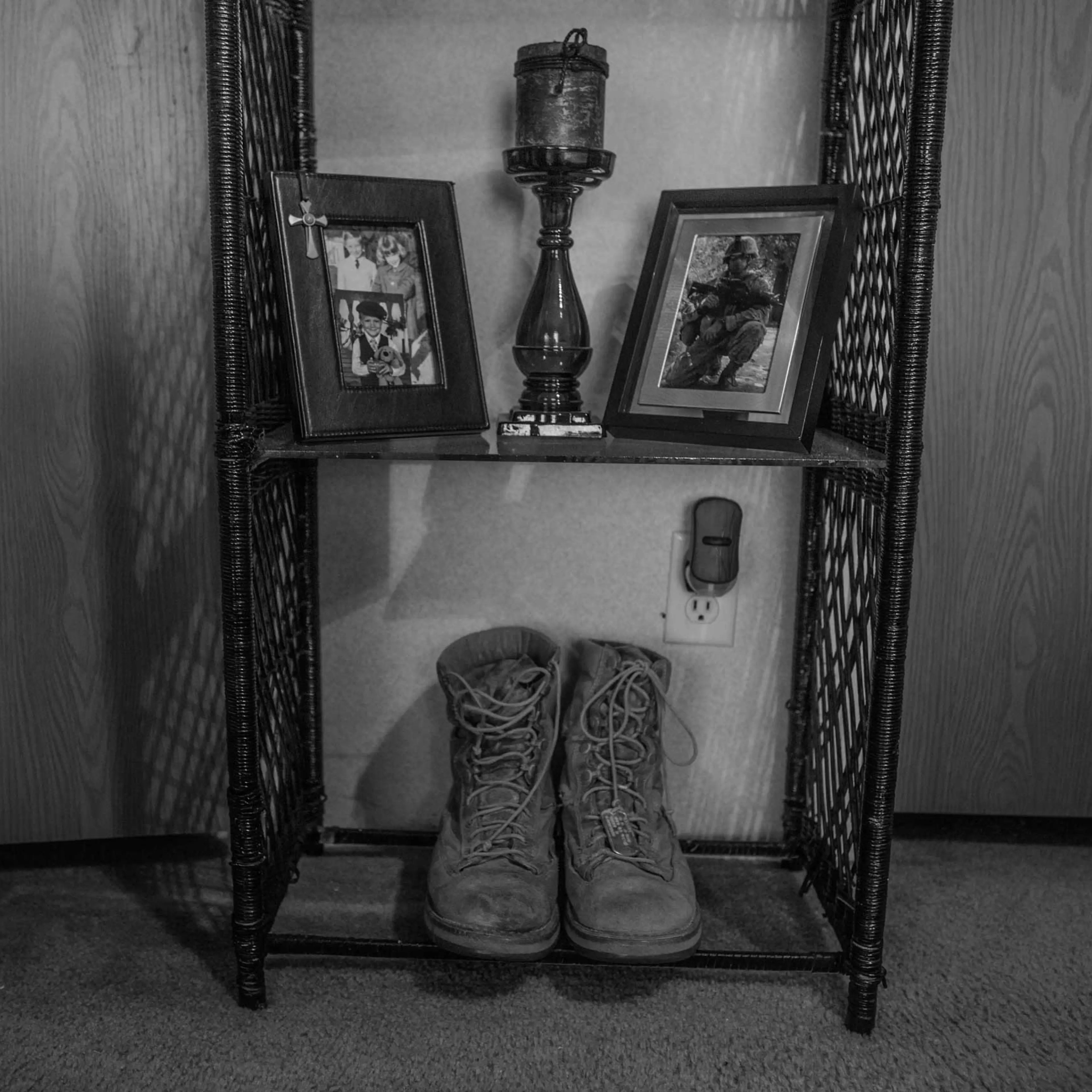 Brandon Ladner. Pelham, Alabama.Brandon Ladner's Marine Corps boots sit on a small shelf in his bedroom. Brandon was a U.S. Marine Corps Veteran. He fought in Afghanistan's Helmand Province.Brandon, suffering from PTSD shot himself inside his living room