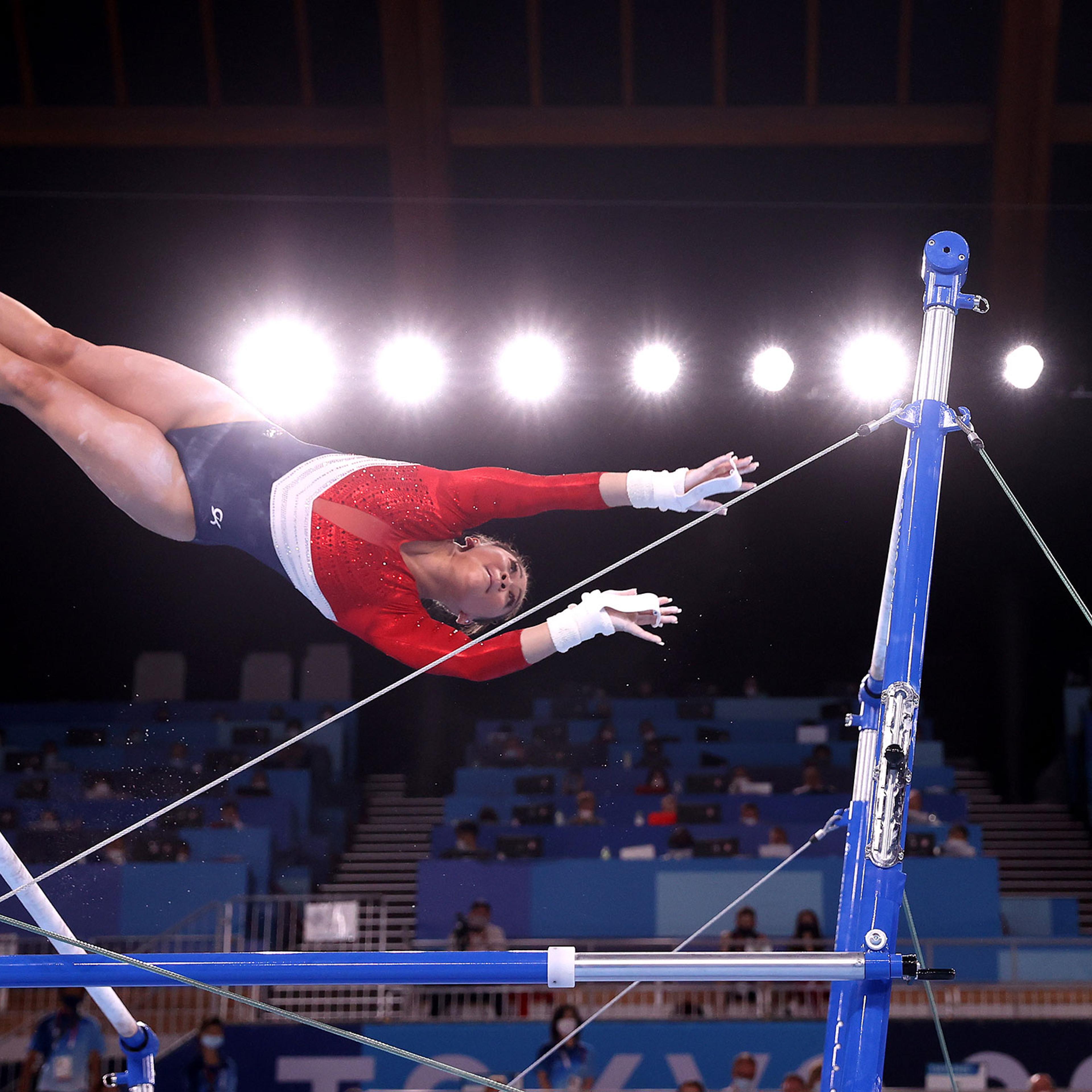 Sunisa Lee of Team United States competes in the uneven bars during the Women's Team Final of the Tokyo 2020 Olympic Games on July 27, 2021.