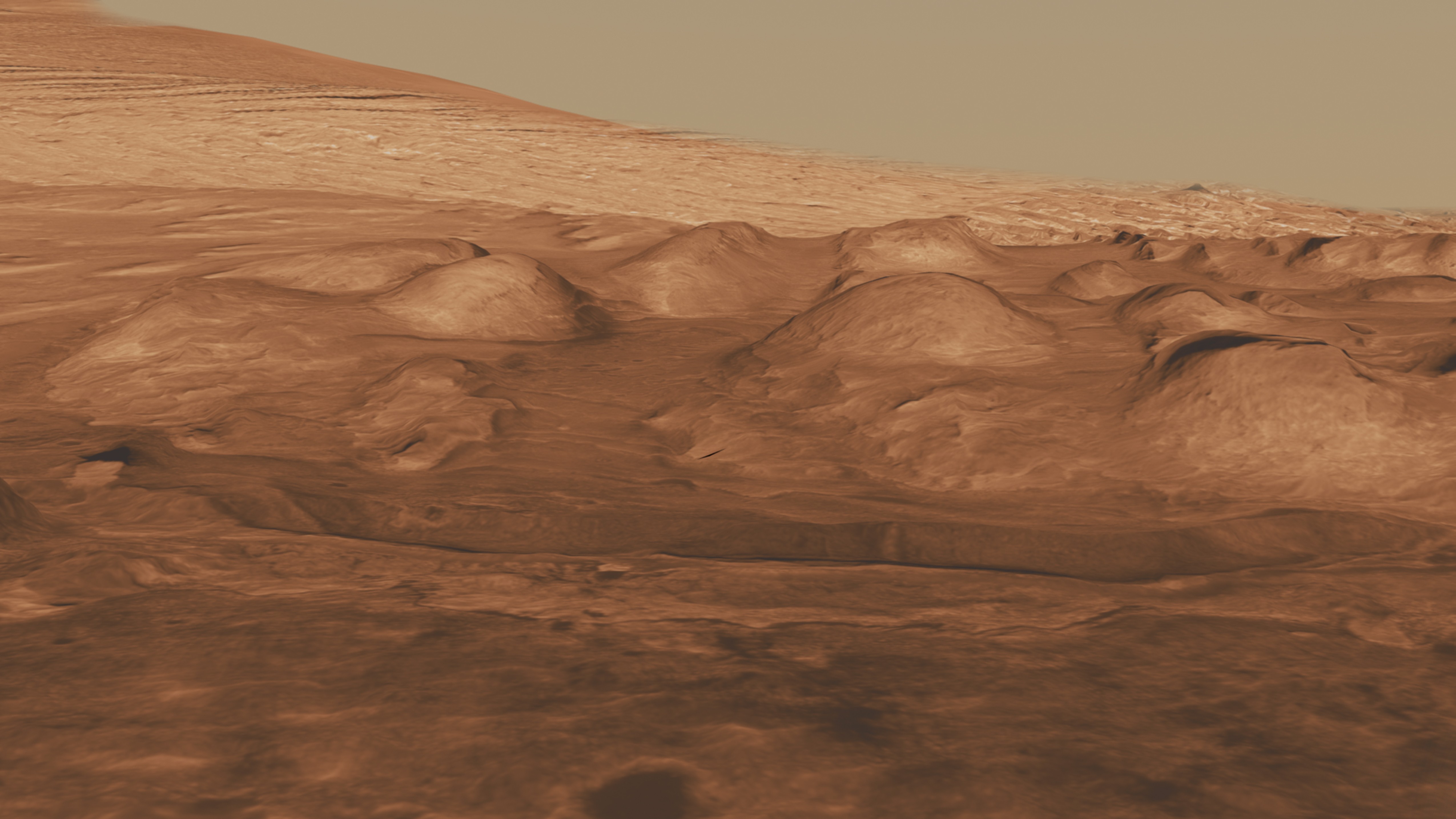 This oblique view of the lower mound in Gale crater shows layers of rock that preserve a record of environments on Mars.