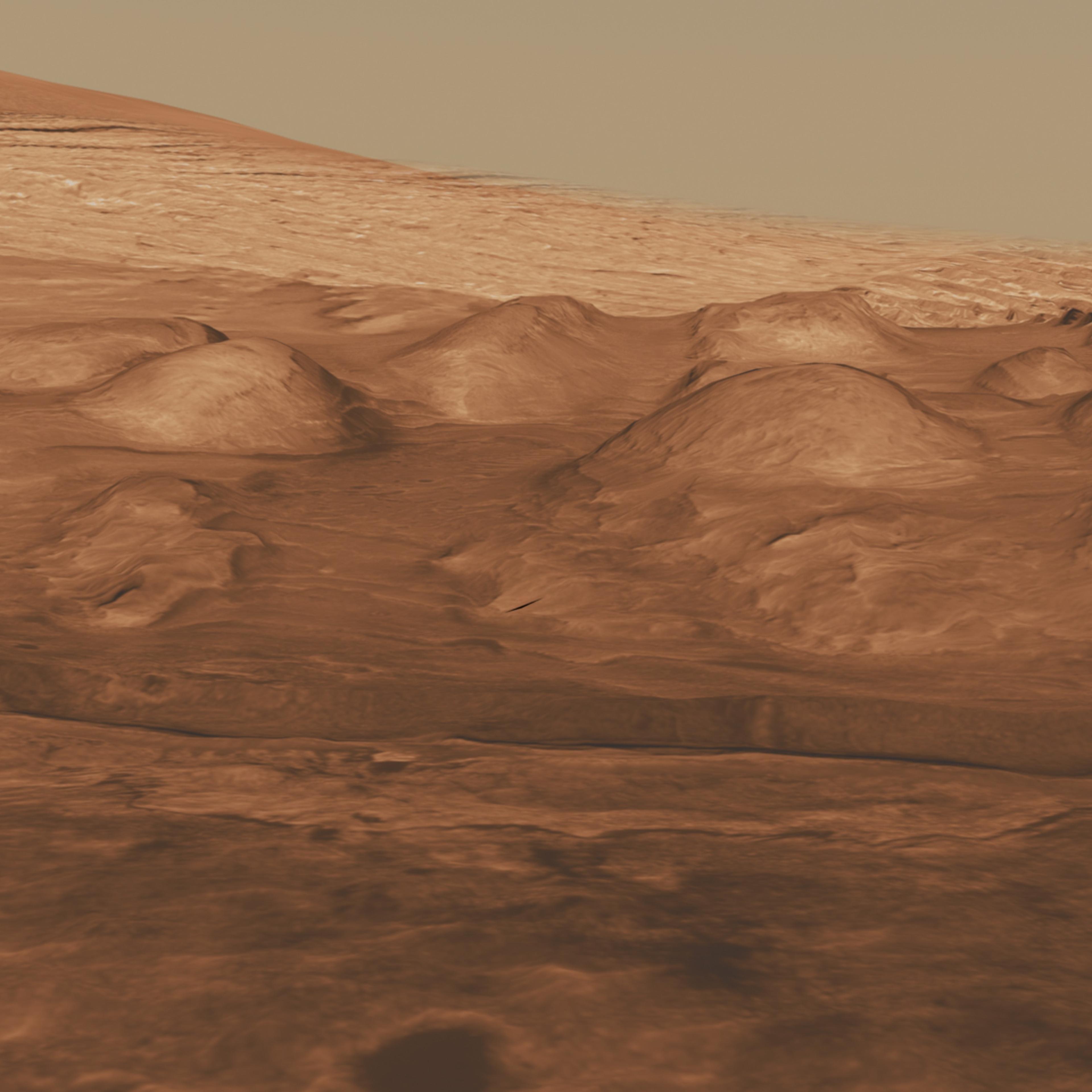 This oblique view of the lower mound in Gale crater shows layers of rock that preserve a record of environments on Mars.