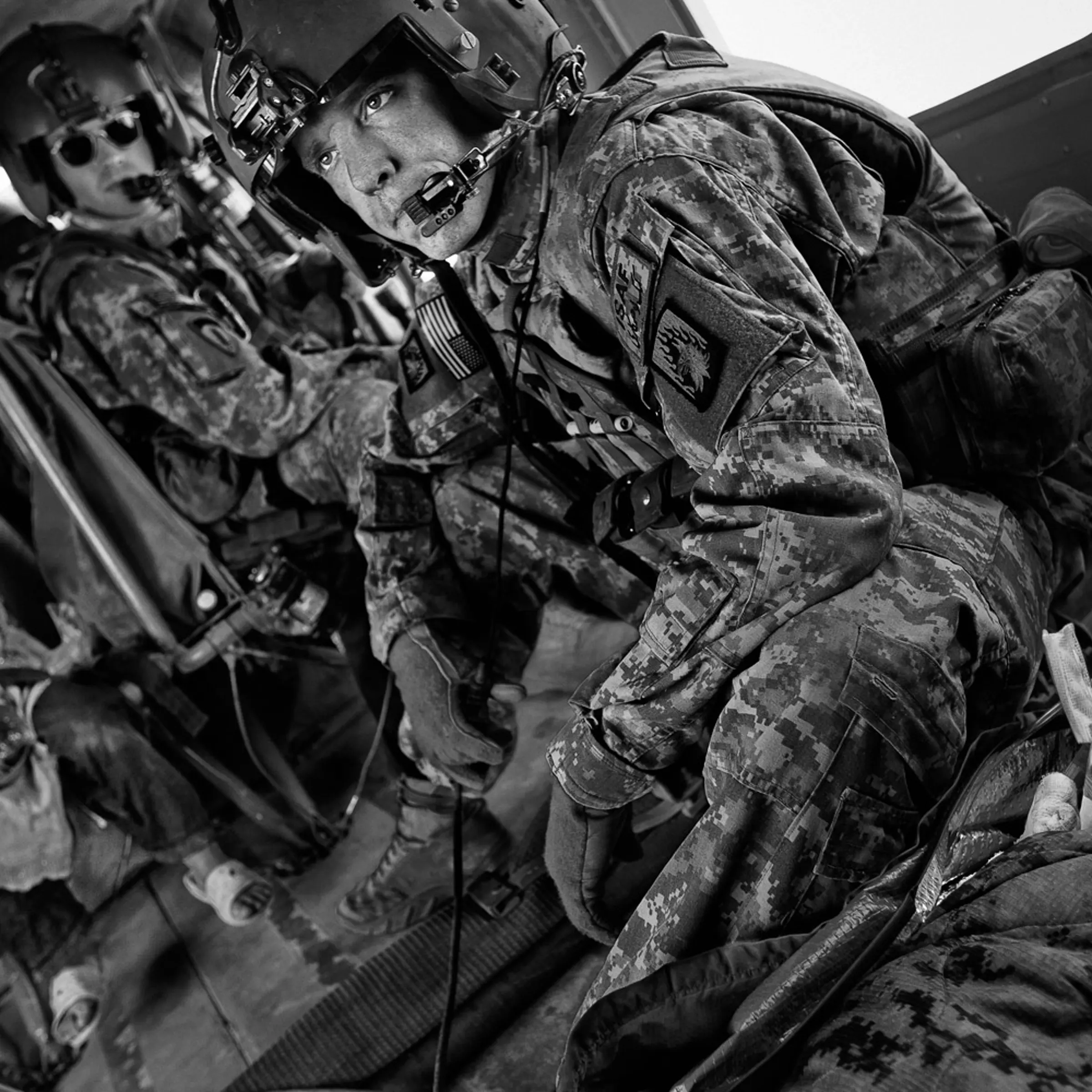 Flight medic Sgt. Billy Raines pauses after treating the wounds of a 4-year-old Afghan girl who was severely burned after a pressure cooker exploded in her home in Helmand Province, May 5, 2011.
