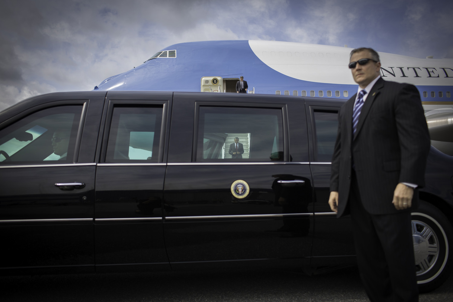 <i>All photographs taken Aug. 18, 2012</i><br />President Obama exits Air Force One upon arriving at the airport in Manchester, N.H.  