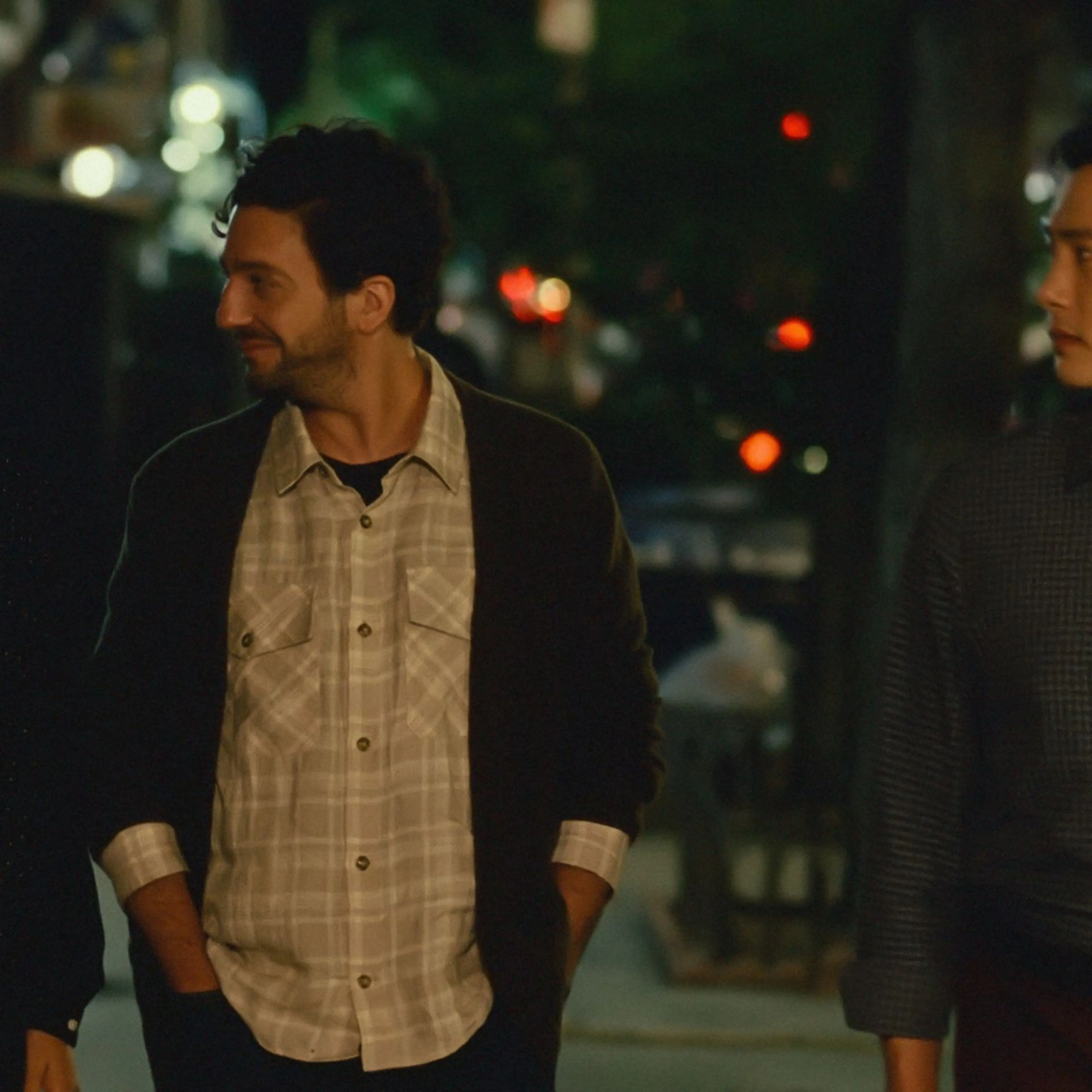 Nora (Greta Lee), Arthur (John Magaro), and Hae Sung (Teo Yoo) stroll through the East Village.