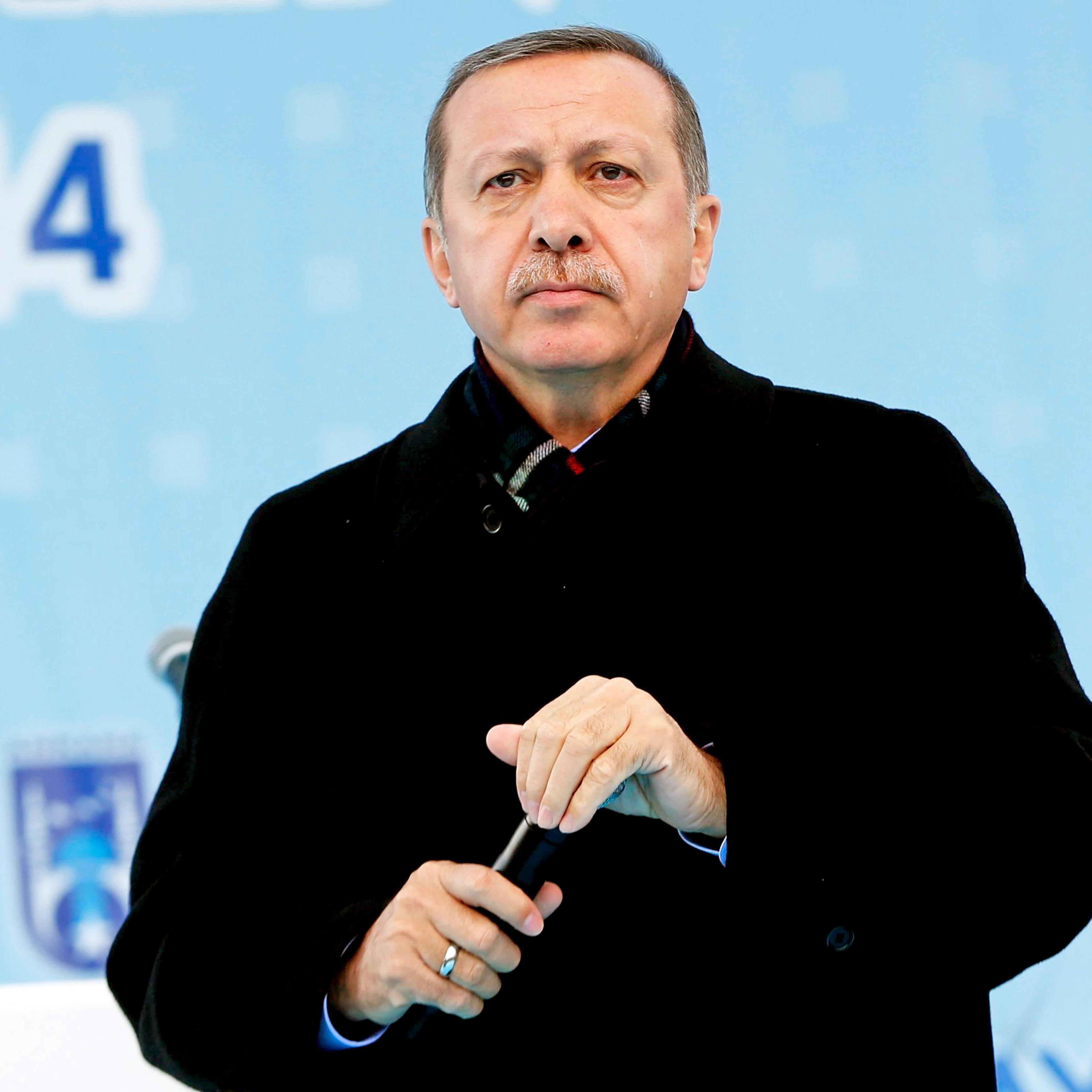 Turkey's Prime Minister Tayyip Erdogan addresses the crowd during an opening ceremony of a new metro line in Ankara on March 13, 2014.