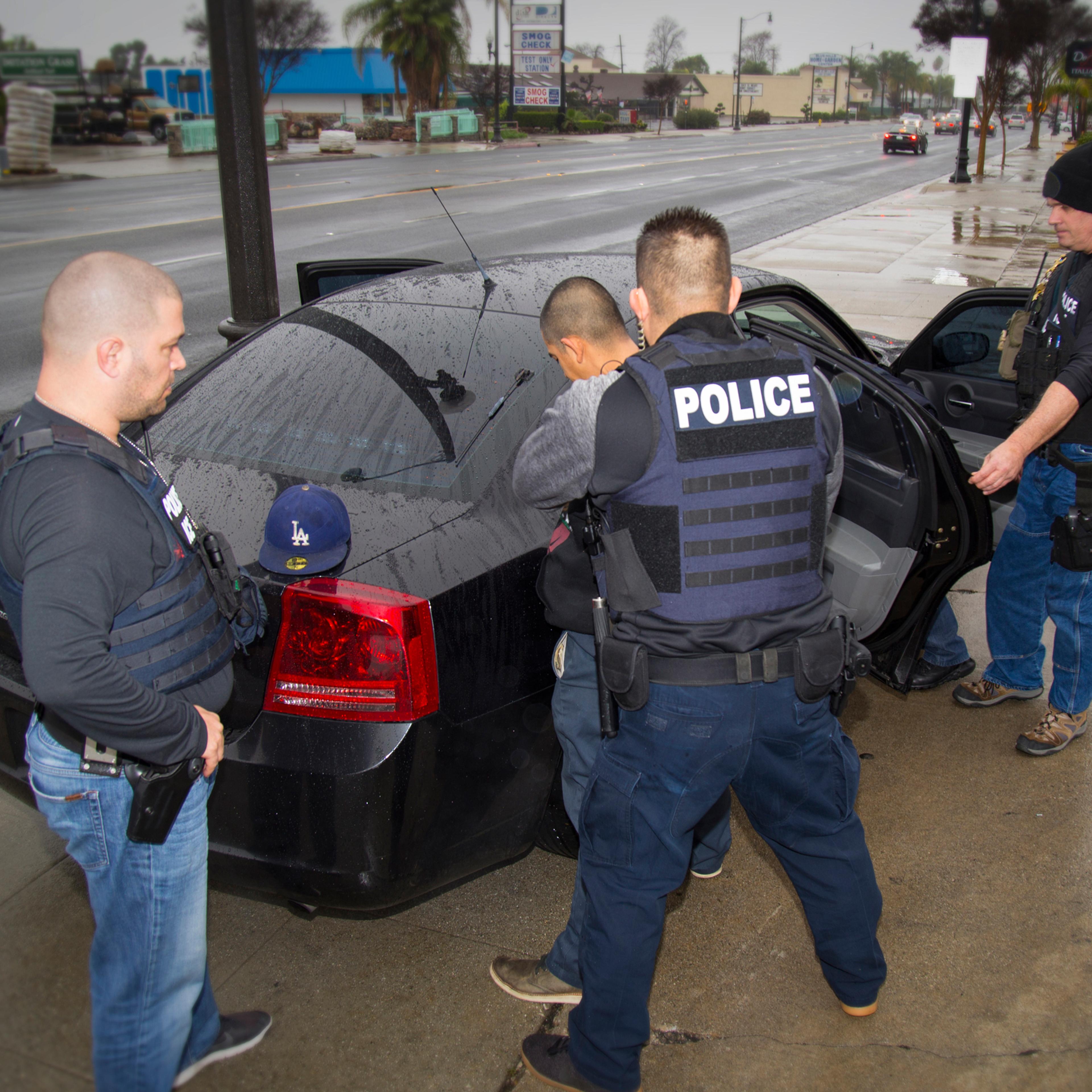 In this Tuesday, Feb. 7, 2017, photo released by U.S. Immigration and Customs Enforcement shows foreign nationals being arrested this week during a targeted enforcement operation conducted by U.S. Immigration and Customs Enforcement (ICE) aimed at immigr