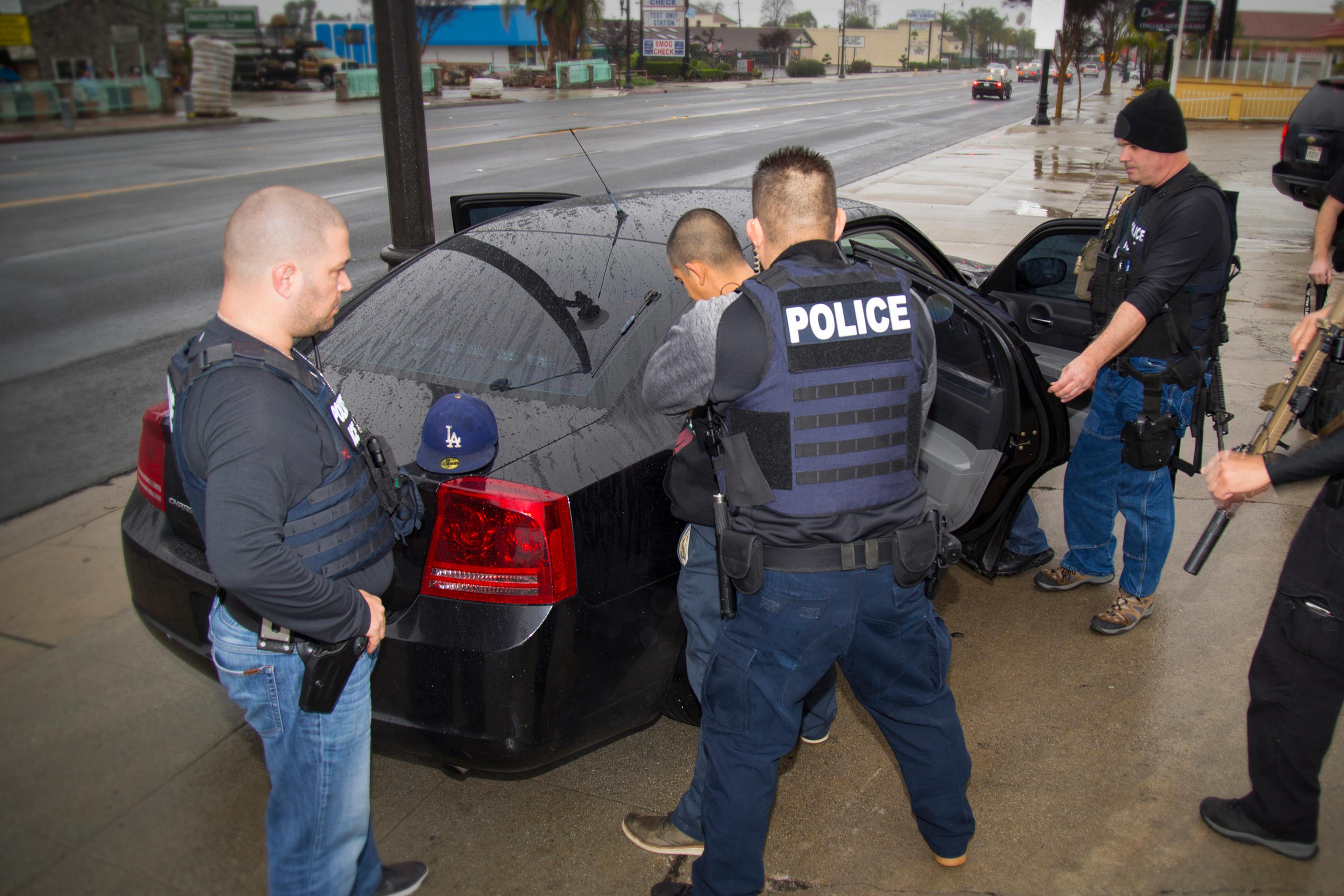 In this Tuesday, Feb. 7, 2017, photo released by U.S. Immigration and Customs Enforcement shows foreign nationals being arrested this week during a targeted enforcement operation conducted by U.S. Immigration and Customs Enforcement (ICE) aimed at immigr