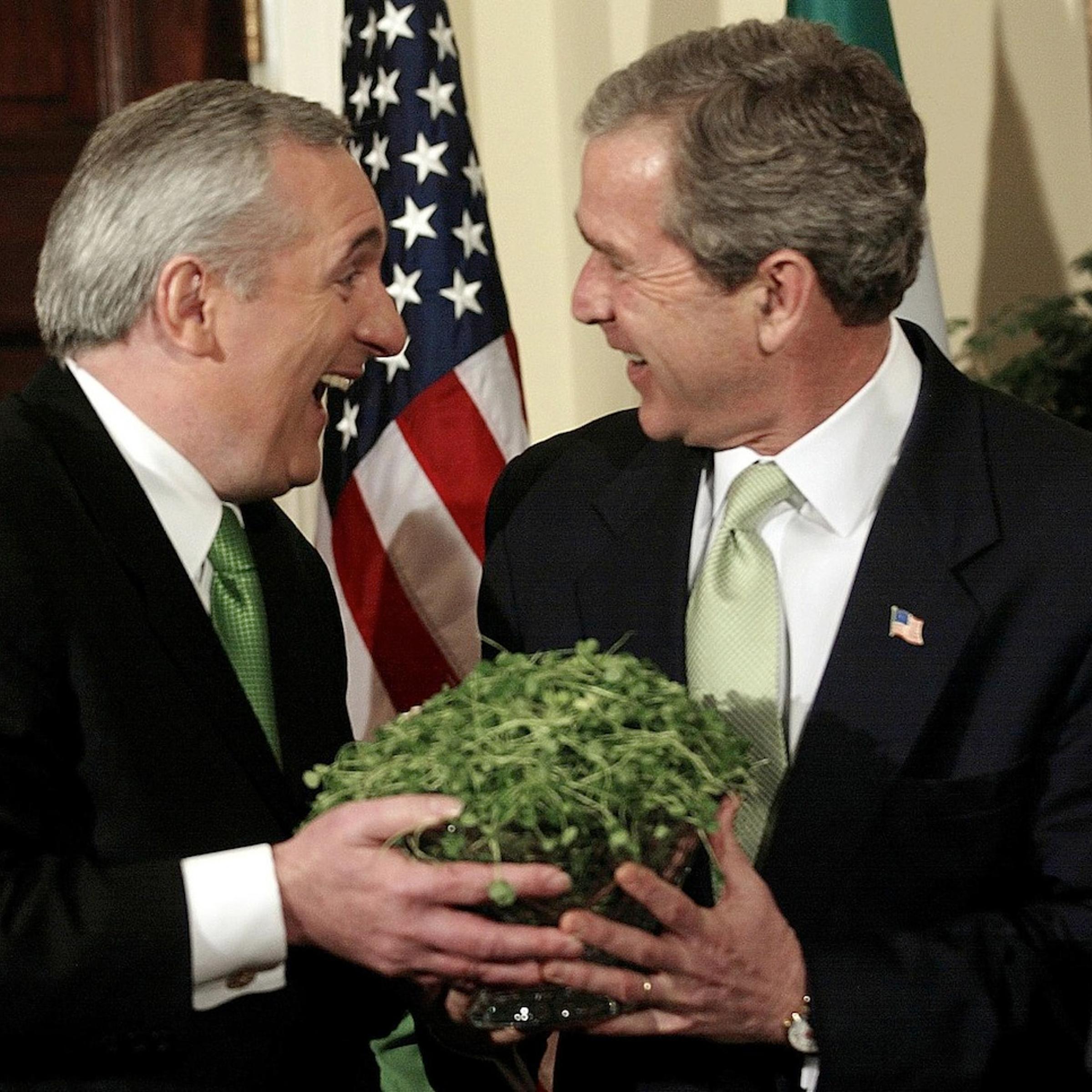 US President George W. Bush receives a bowl of sha