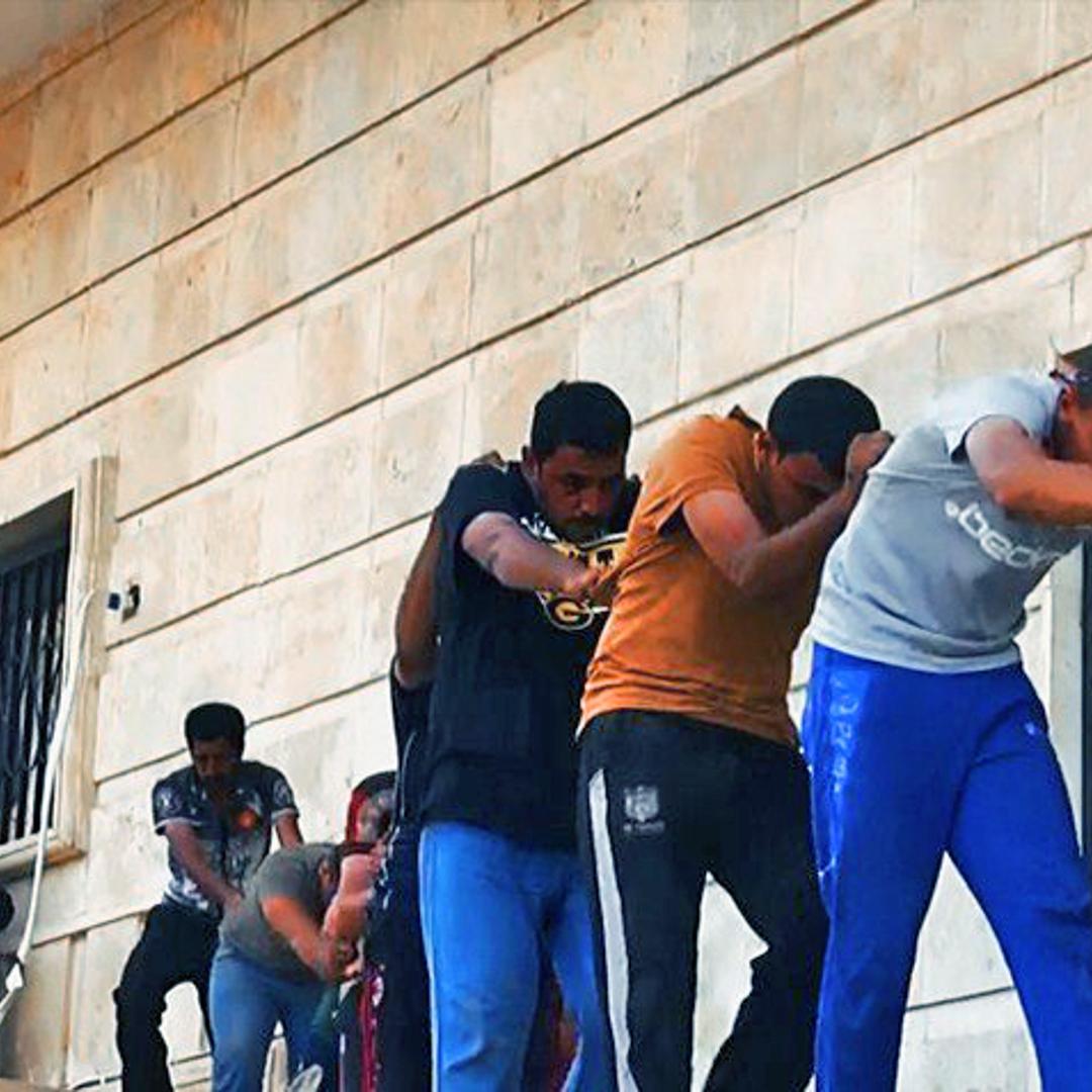 An image uploaded on June 14, 2014 on the jihadist website Welayat Salahuddin allegedly shows militants of ISIS capturing dozens of Iraqi security forces members prior to transporting them to an unknown location in the Salaheddin province ahead of execut