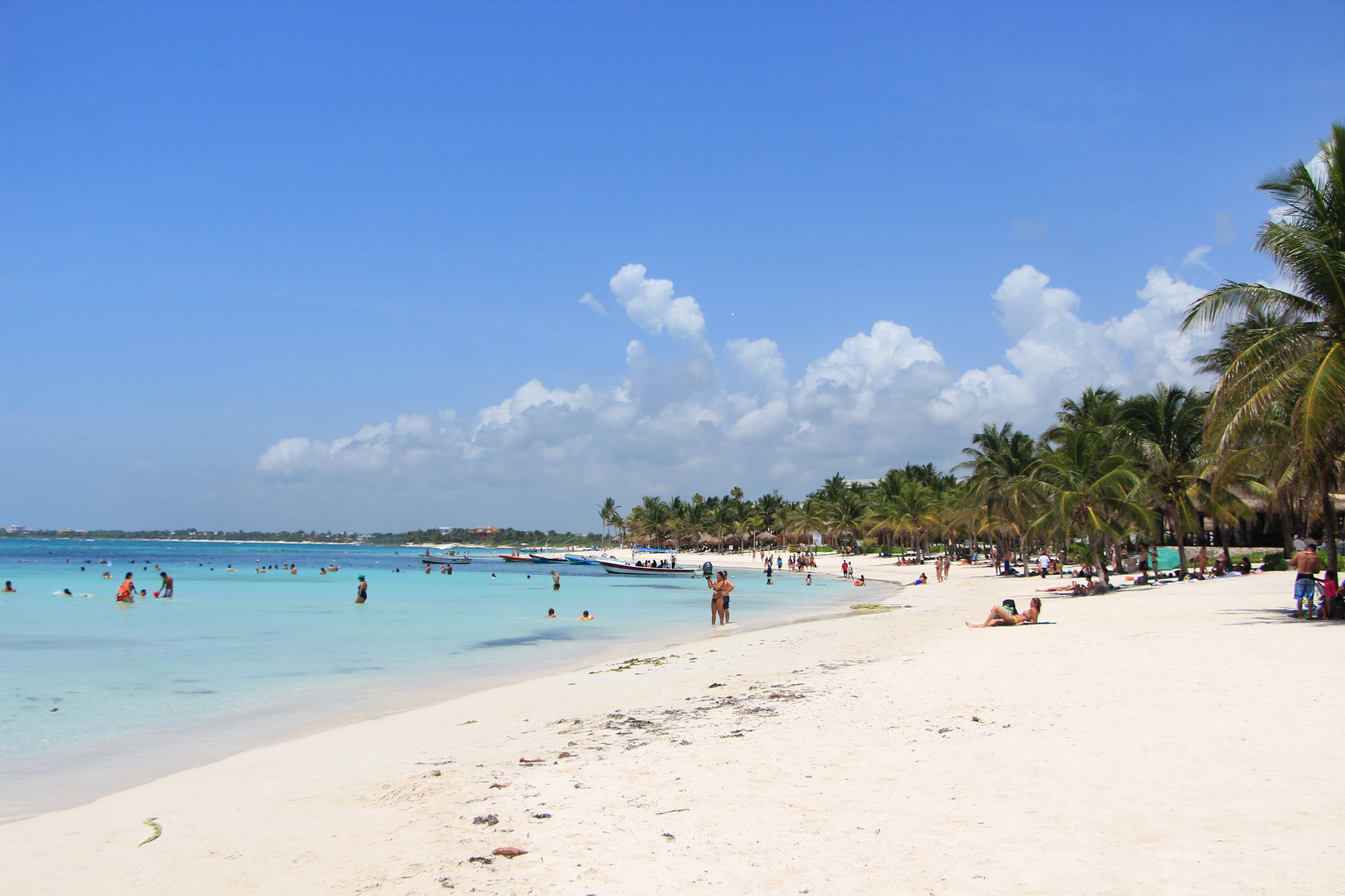 Scenic View Of Beach Against Blue Sky