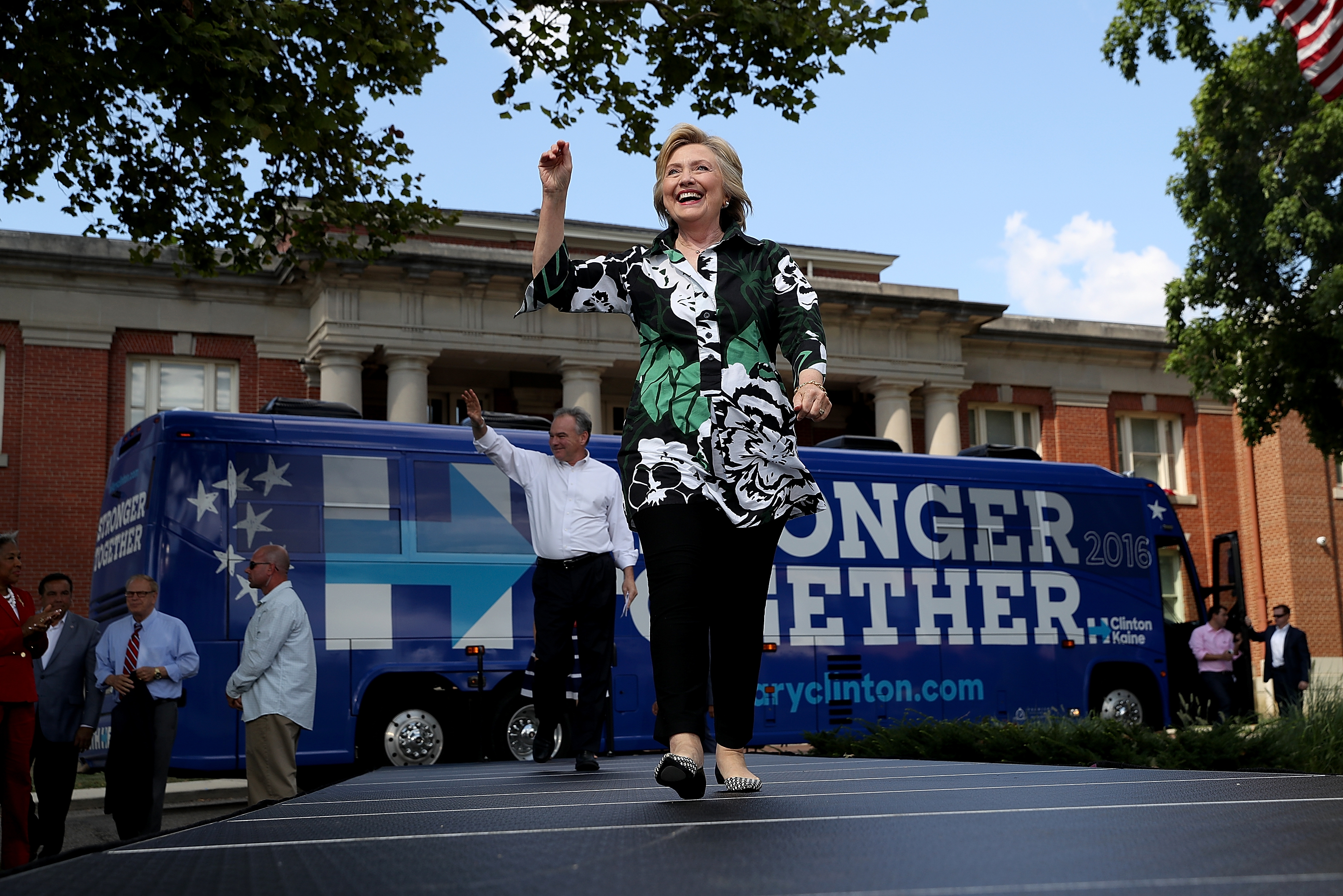 Democratic presidential nominee former Secretary of State Hillary Clinton and Democratic vice presidential nominee Sen Tim Kaine (D-VA) greet supporters during a campaign rally at Fort Hayes Vocational School in Columbus, Ohio on July 31, 2016.