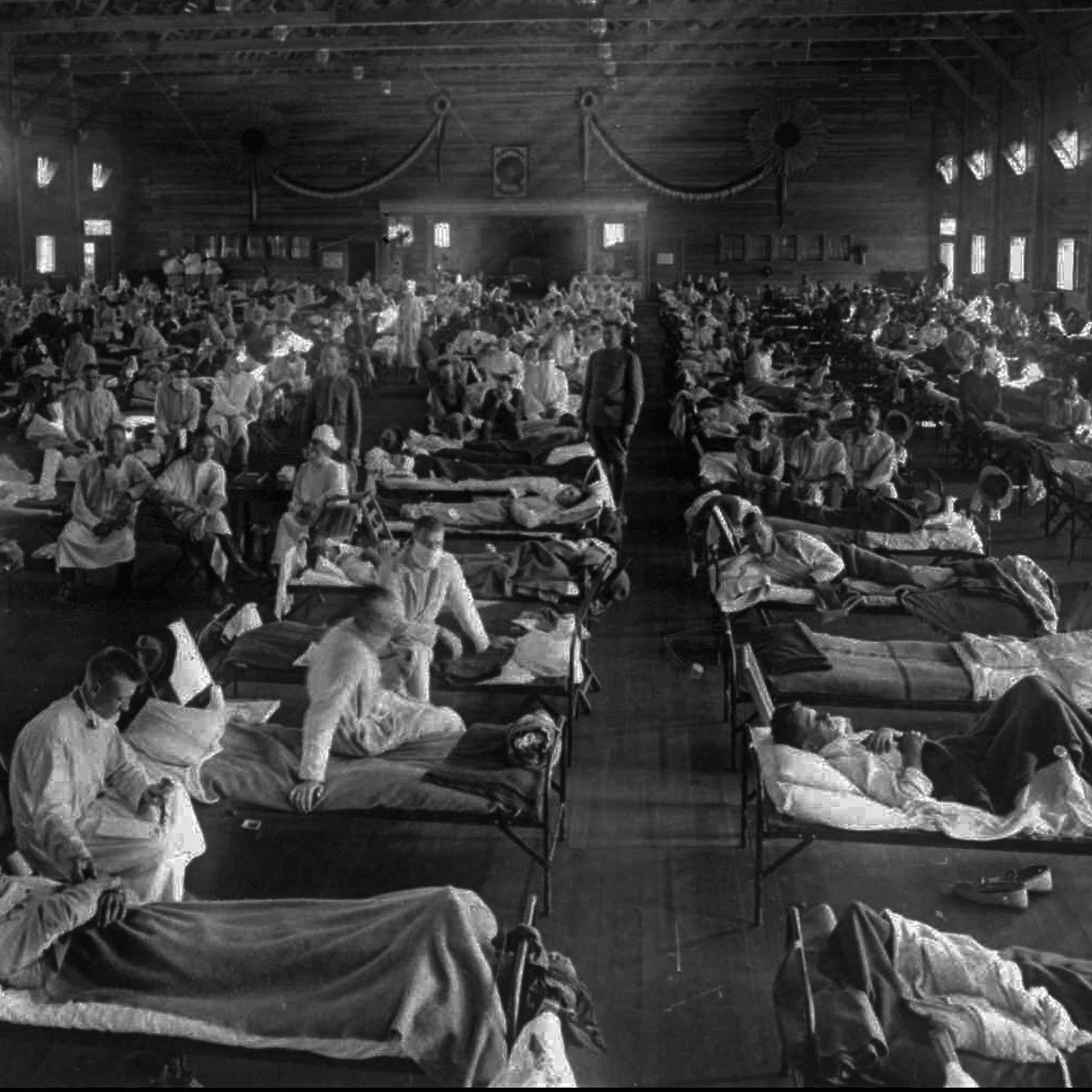 Influenza victims crowd into an emergency hospital near Fort Riley, Kans., in this 1918 file photo.